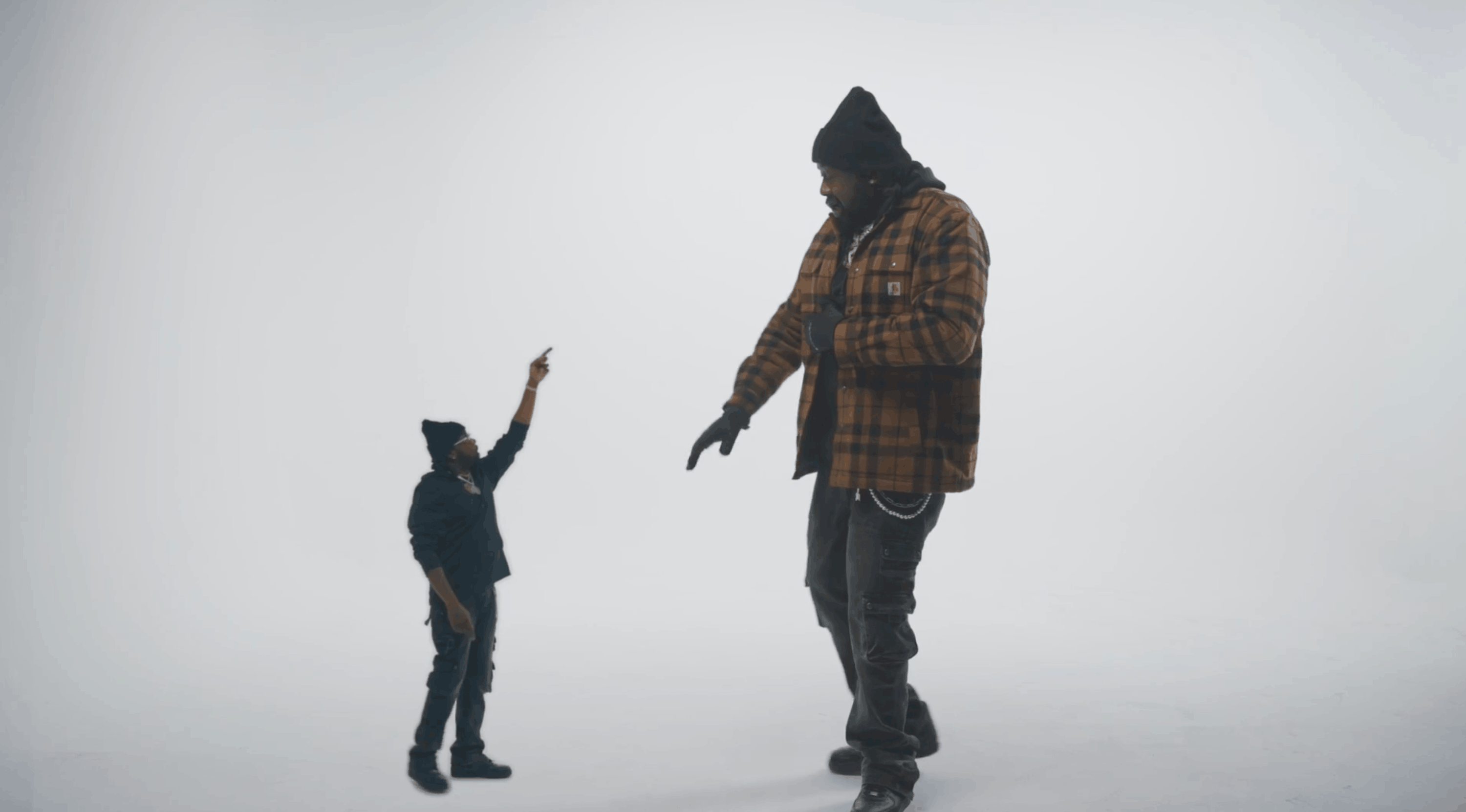 Rapper Conway the Machine performing on a white cyc stage during a minimalist music video shoot