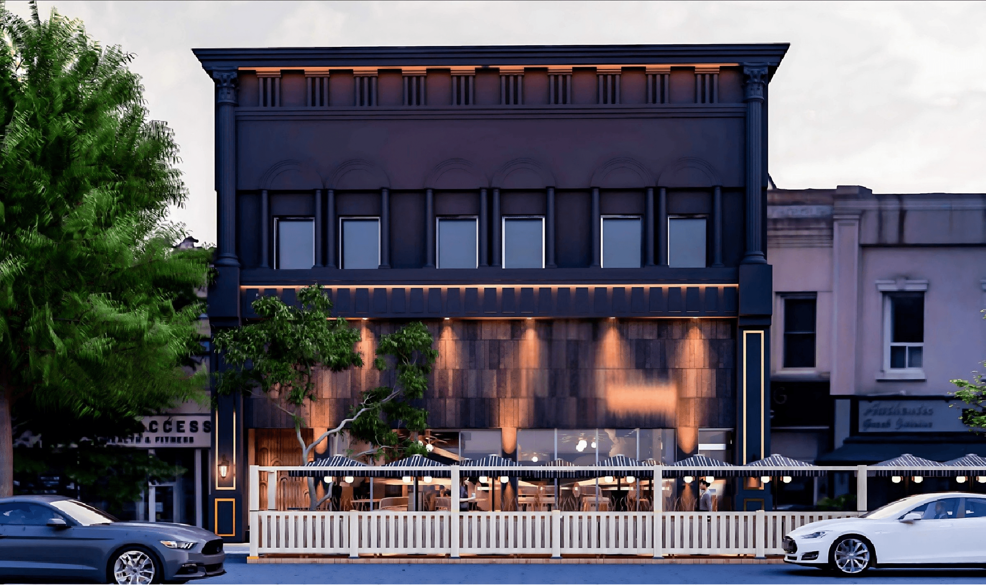 Dhoom Toronto restaurant exterior with modern architectural façade and warm lighting, showcasing the design philosophy that blends elegance with urban Indian dining.