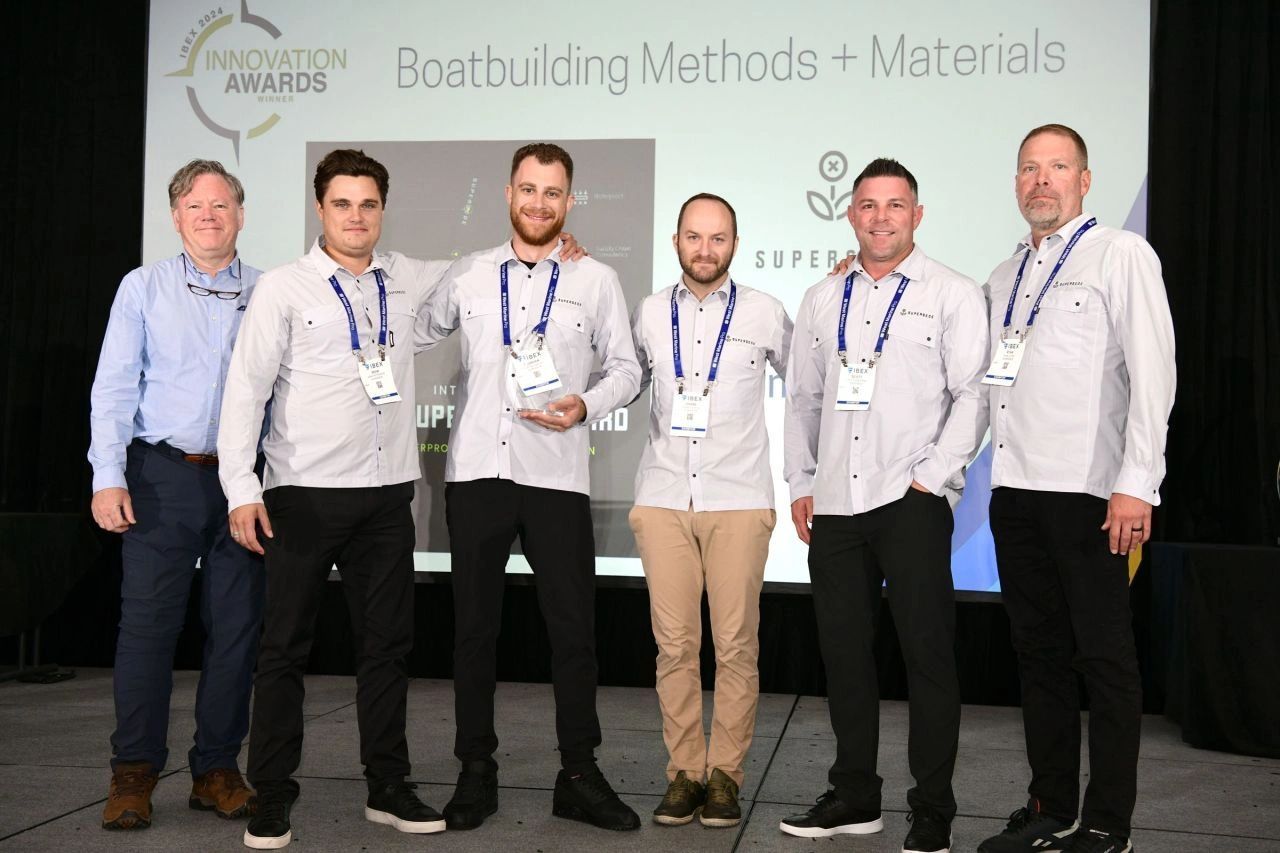 a black and white living room with a large tv