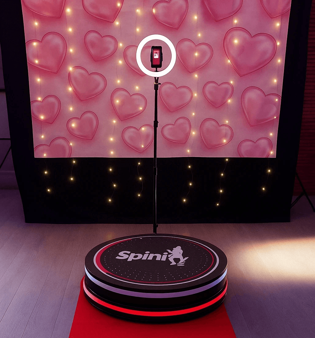 Spinzy 360 photobooth Gold package setup with custom backdrop