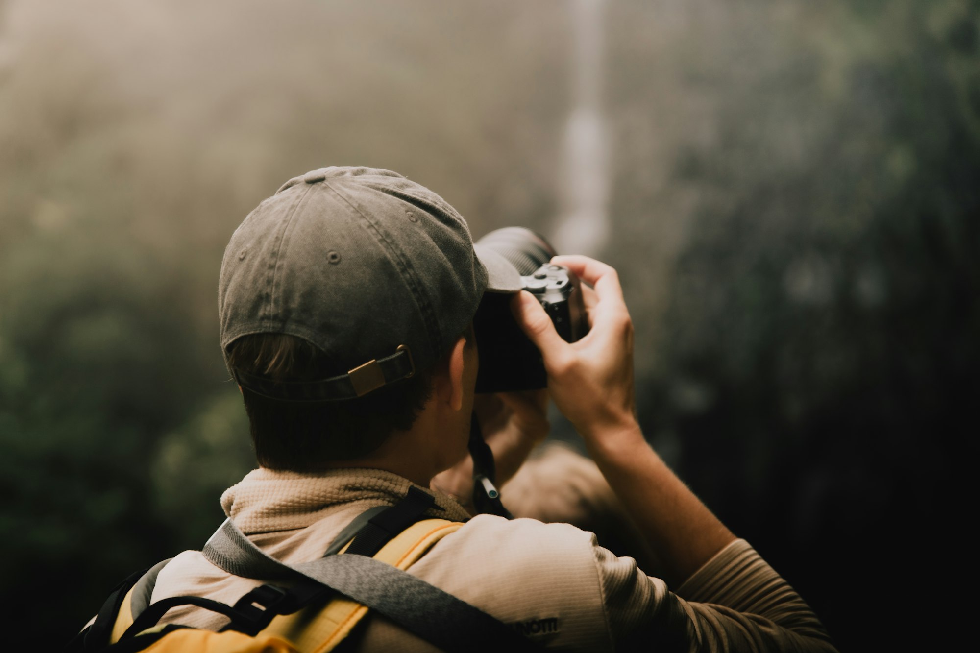 a man is taking a picture with a camera