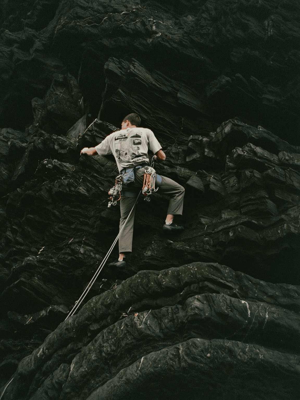 Friends in streetwear chatting outdoors, candid group shot.