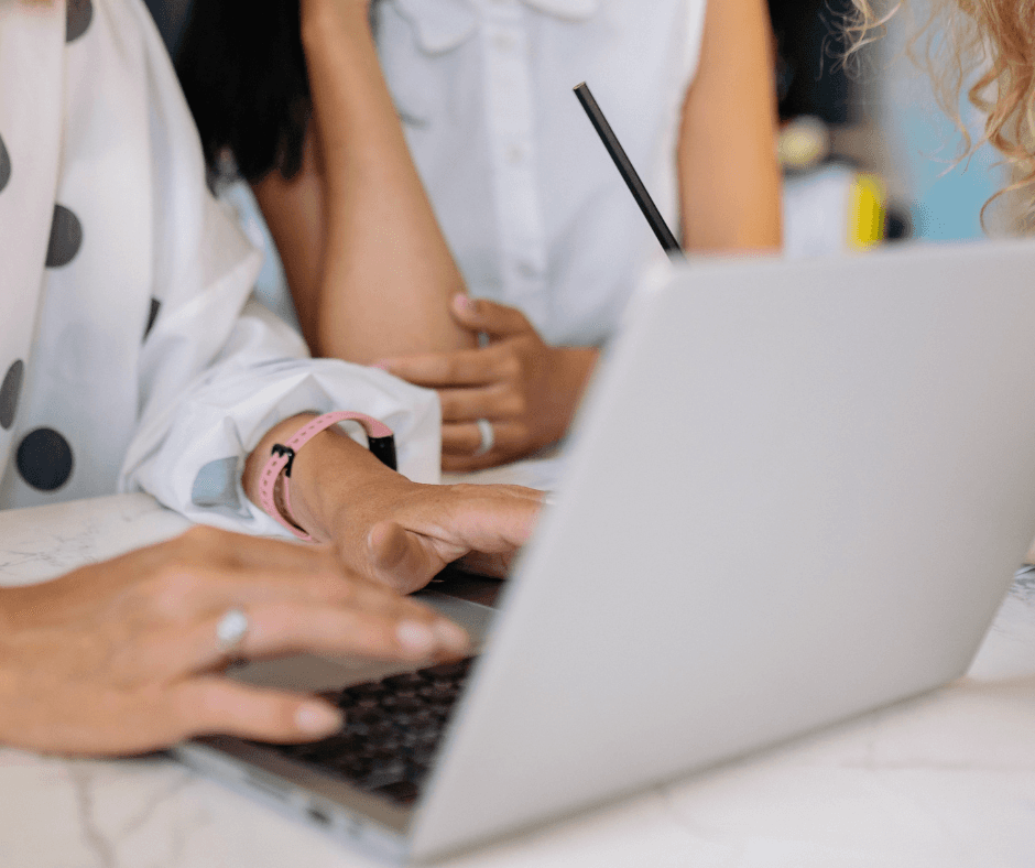 people sitting on chair in front of laptop computers