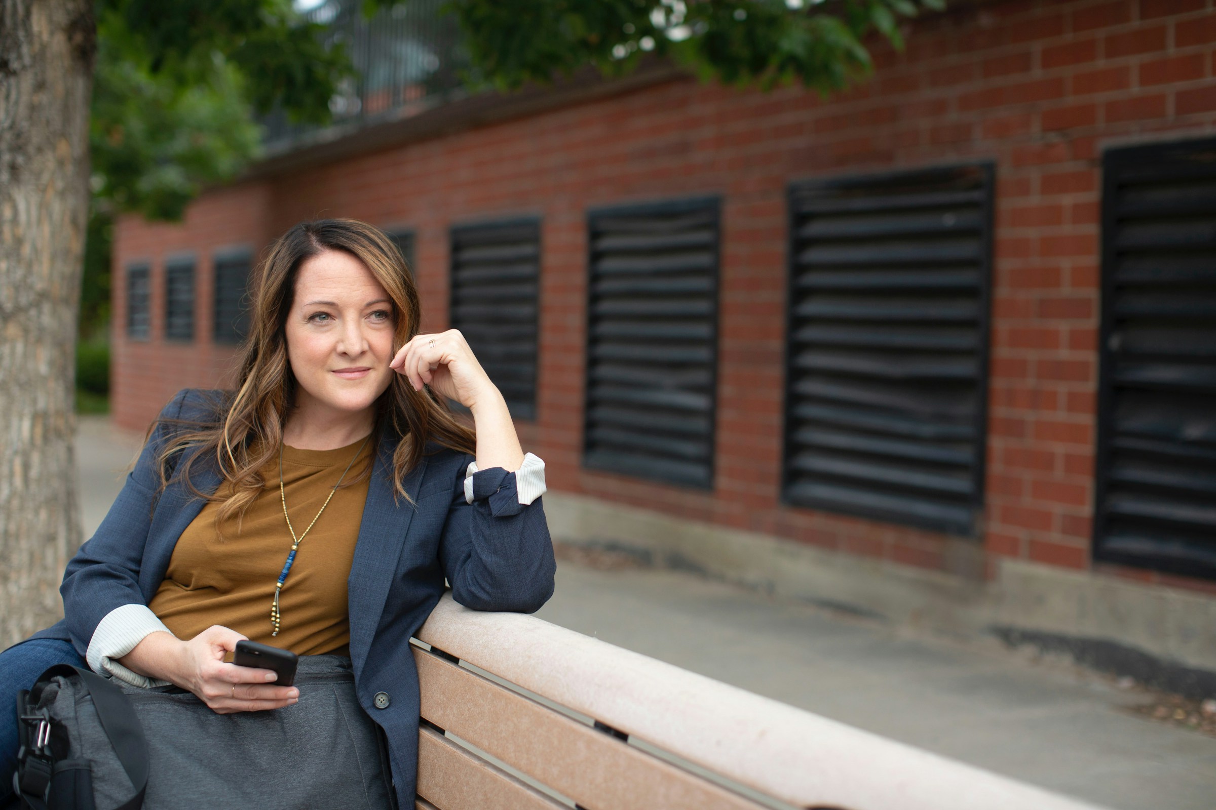 woman sitting on bench - Casual Outfits for Women