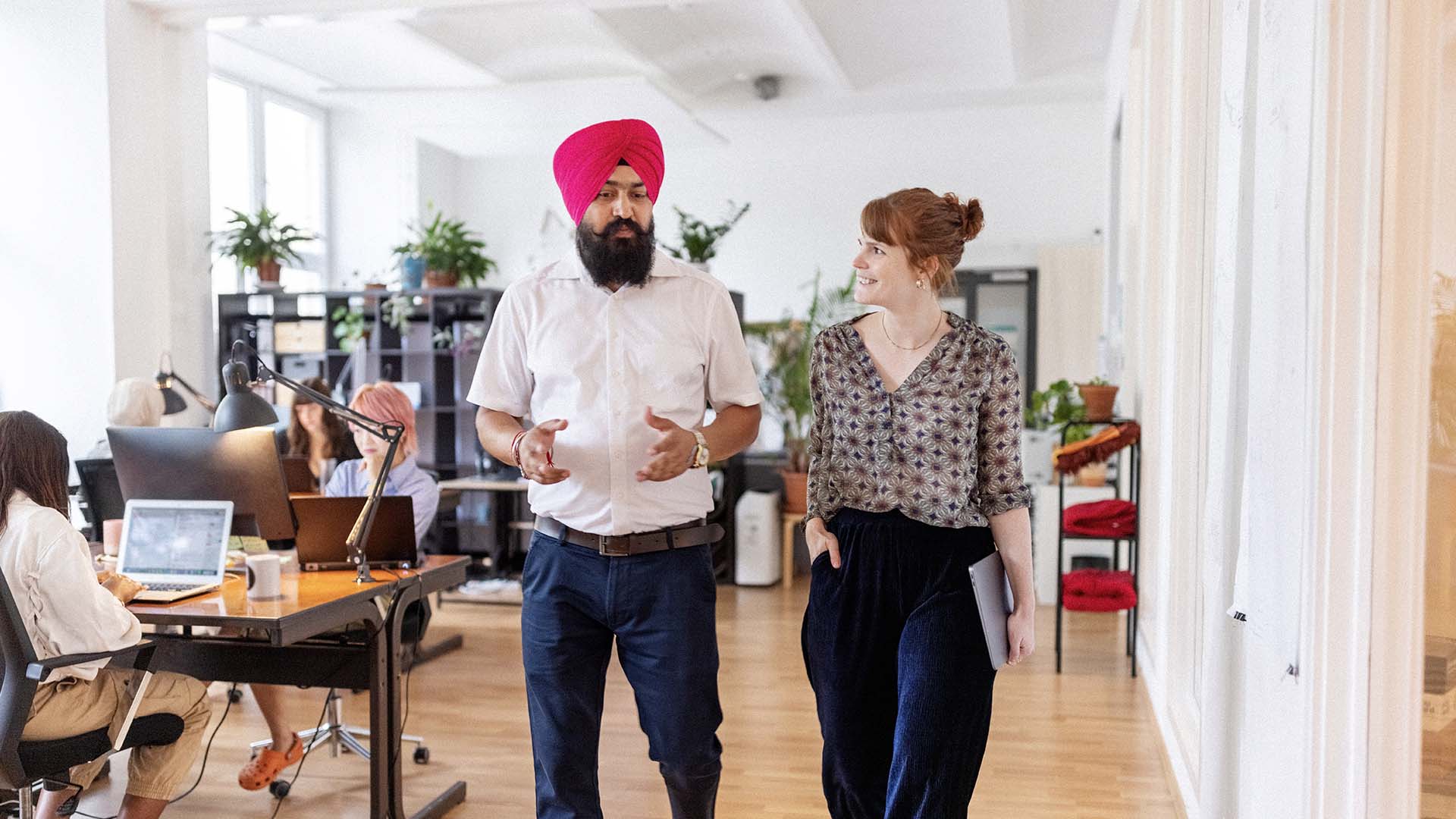 Sikh man and woman in the office