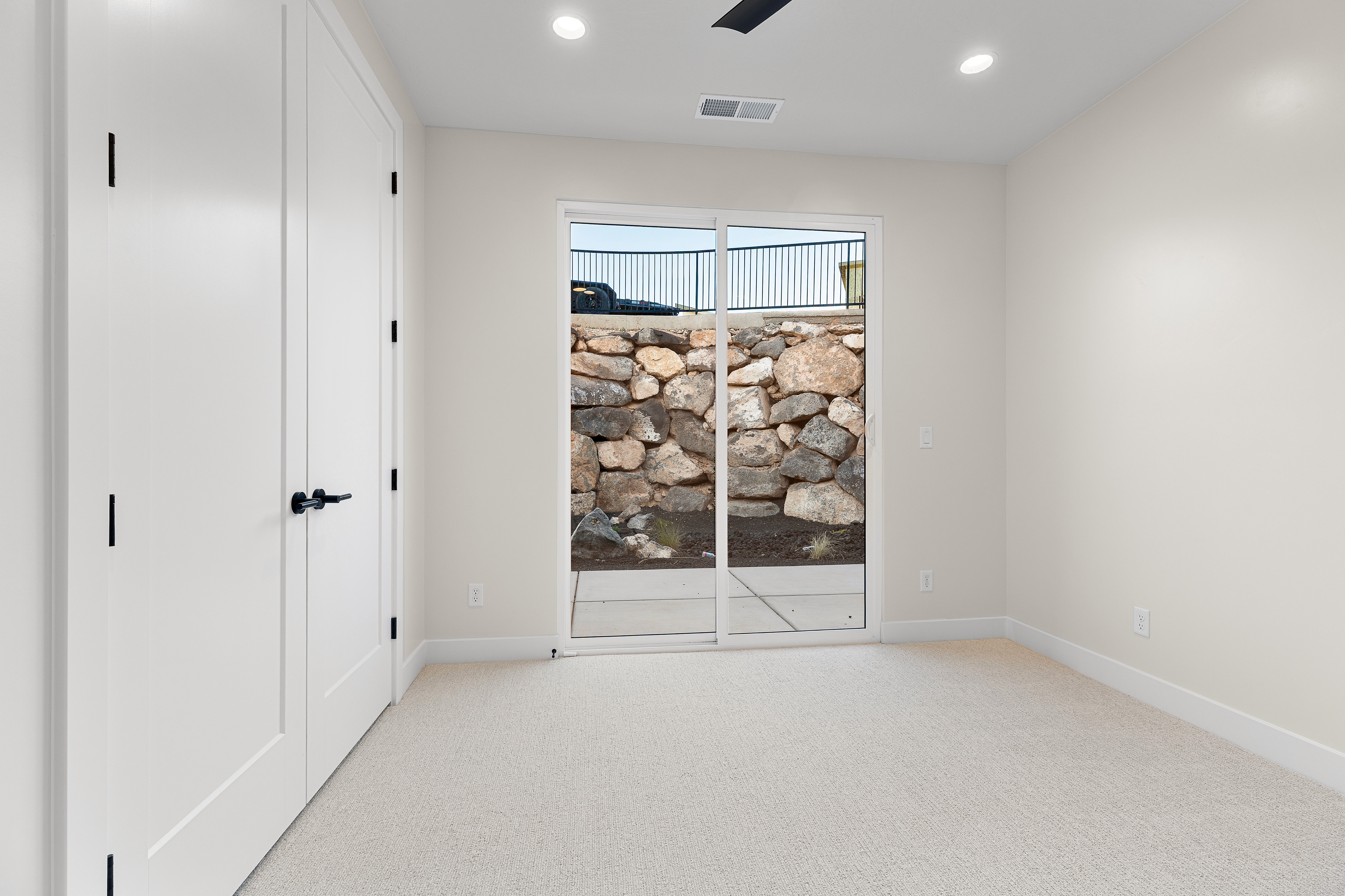 Secondary bedroom in a Southern Utah home with functional layout