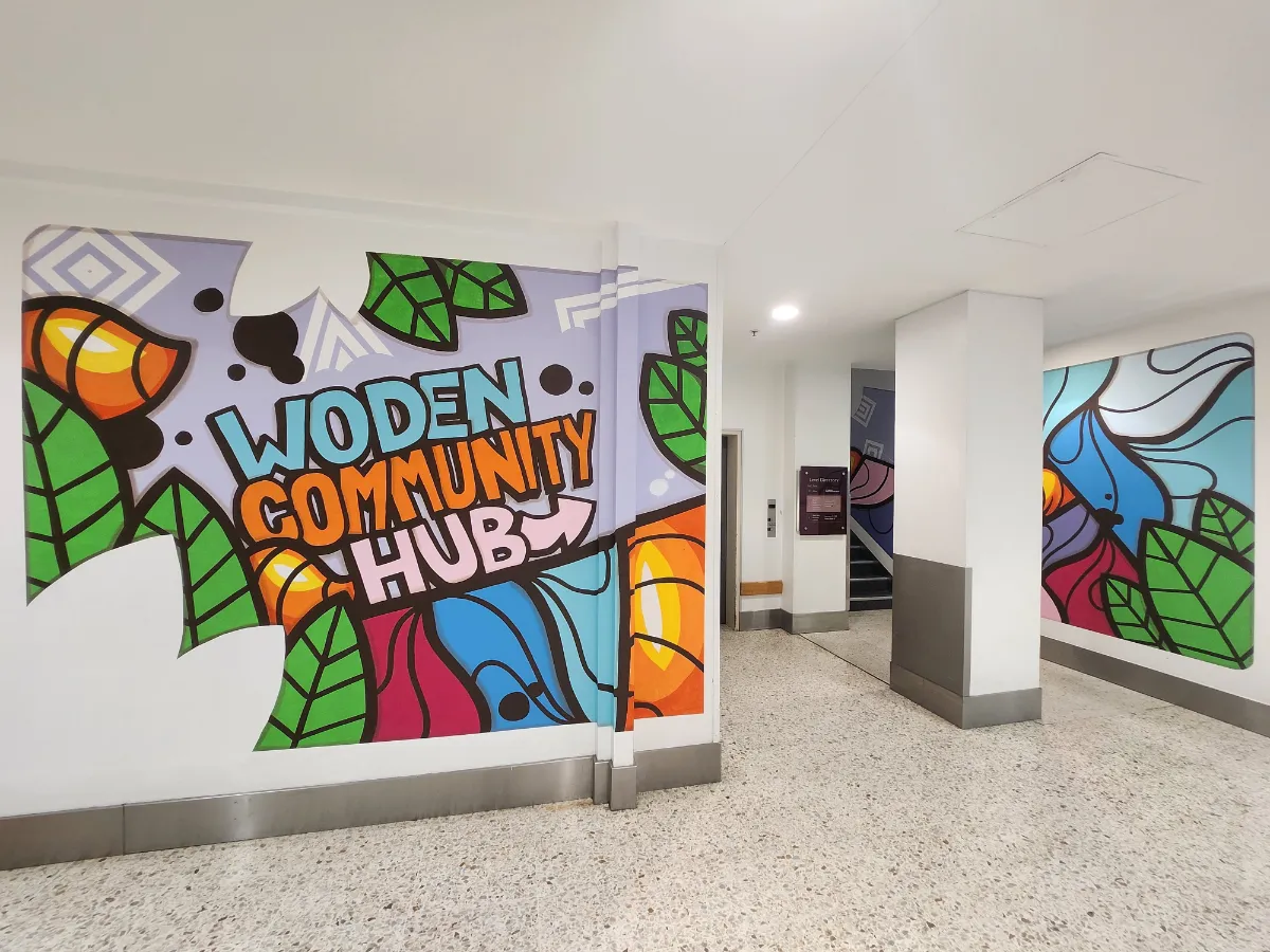 Entrance to Woden Community Hub, decorated by an art mural