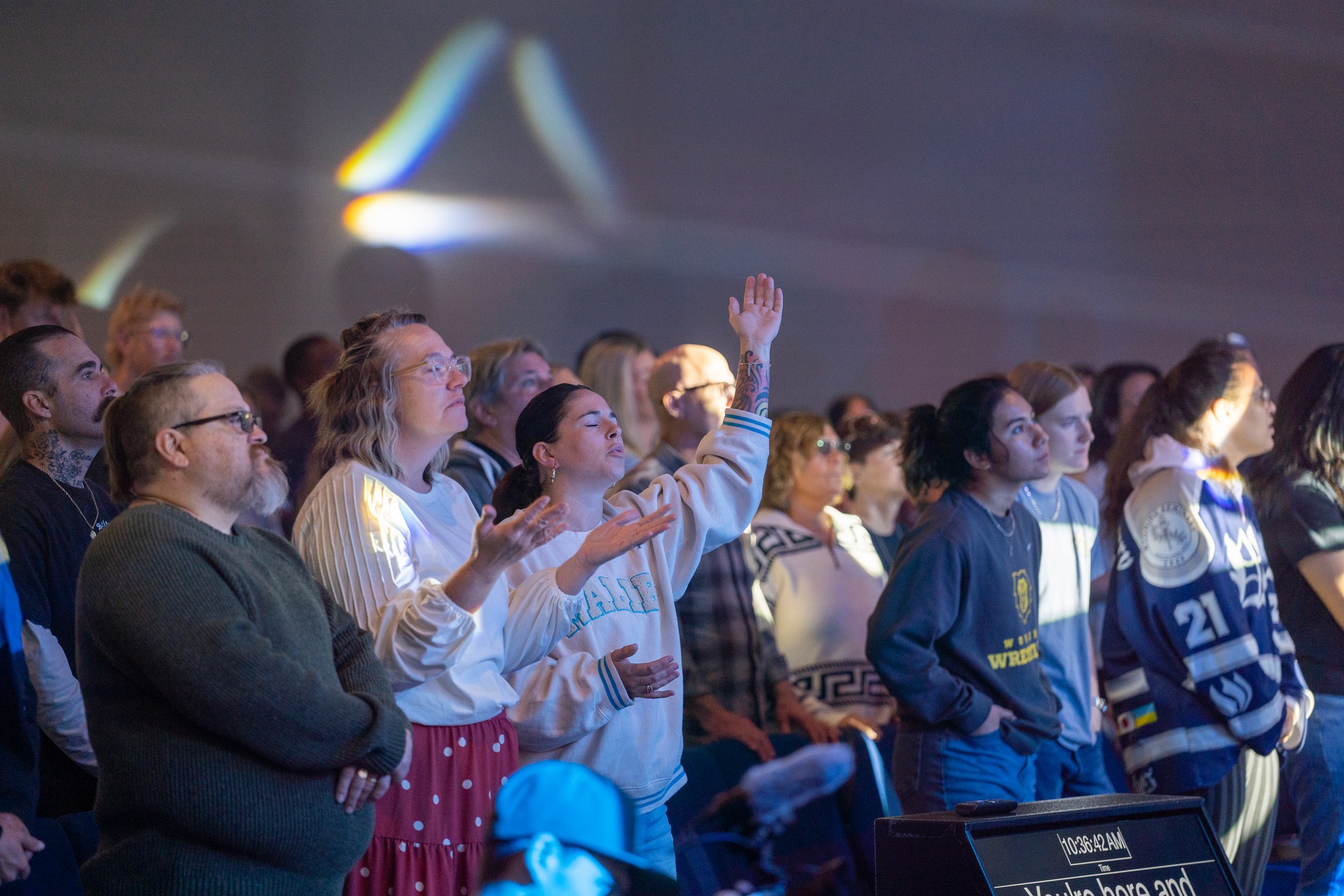 person writing on a piece of paper