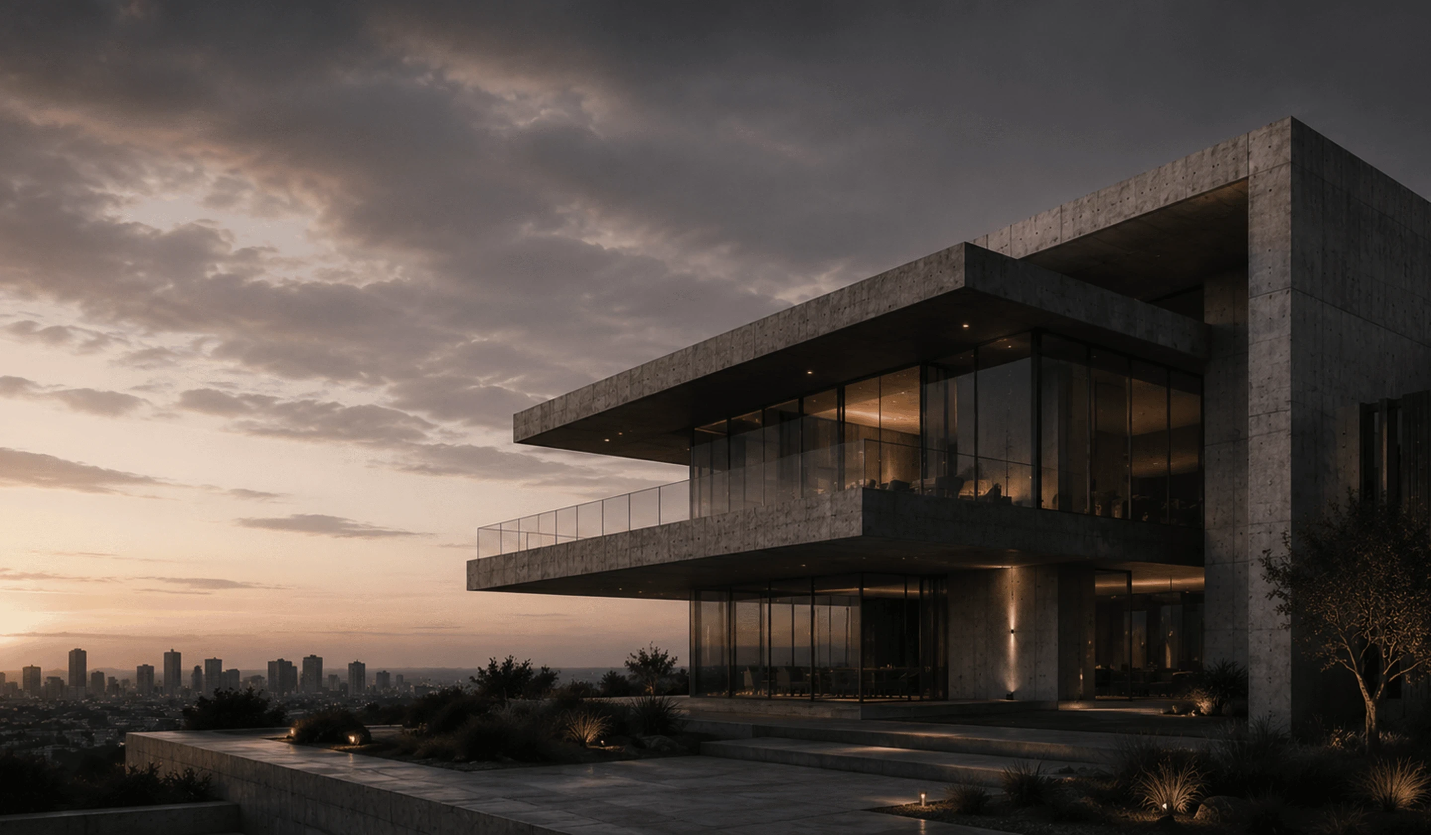 Cantilevered concrete building lit from within at dusk, overlooking a city skyline