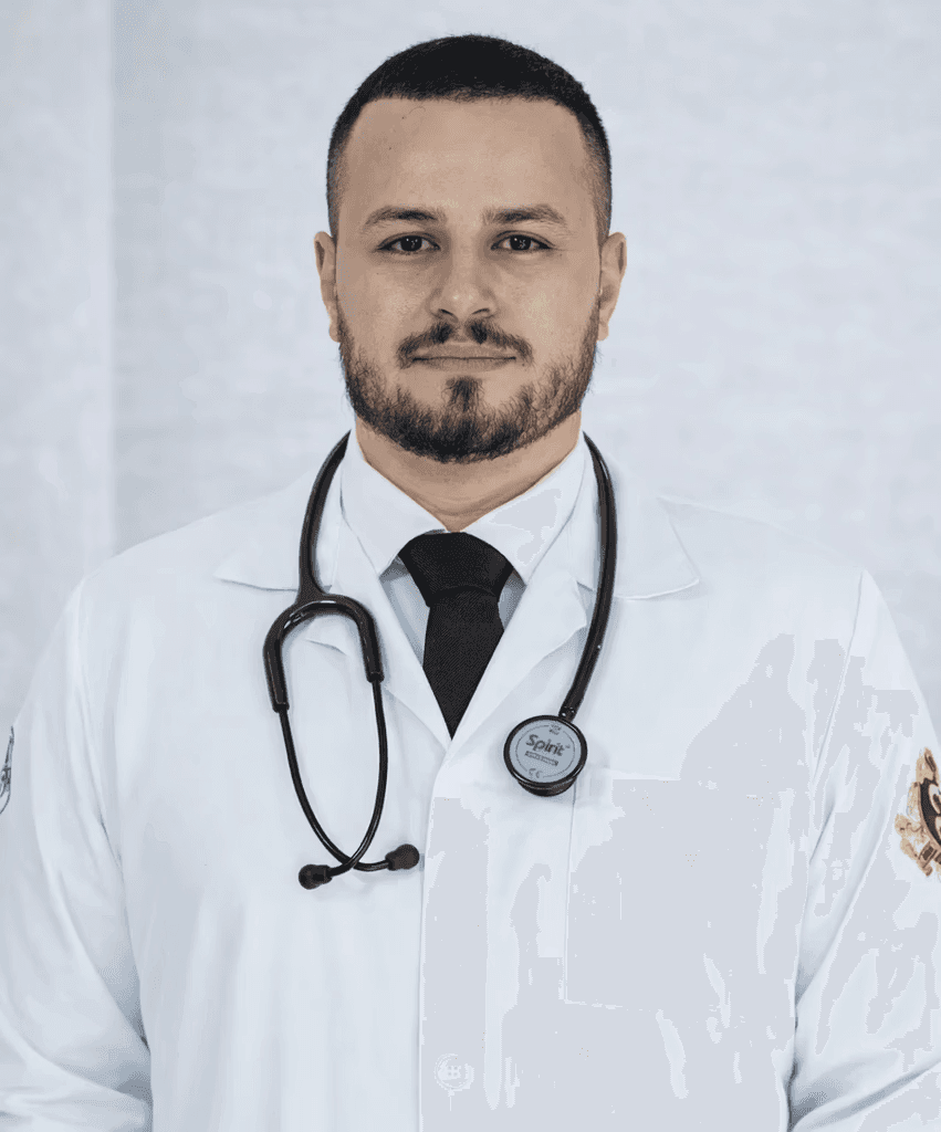 man in white dress shirt wearing black framed eyeglasses