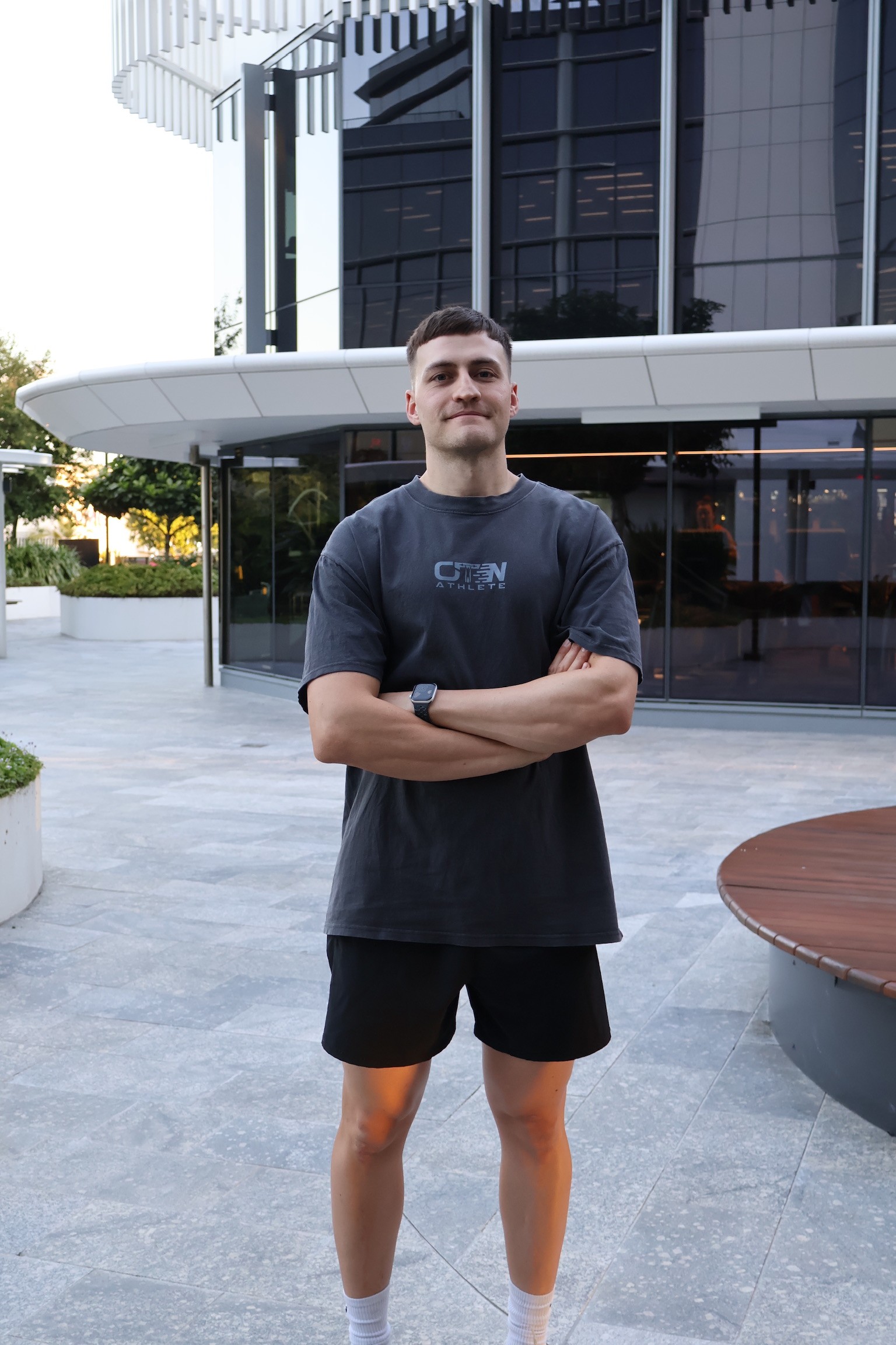 Rachel Stone, personal trainer working out sweaty with a barbell