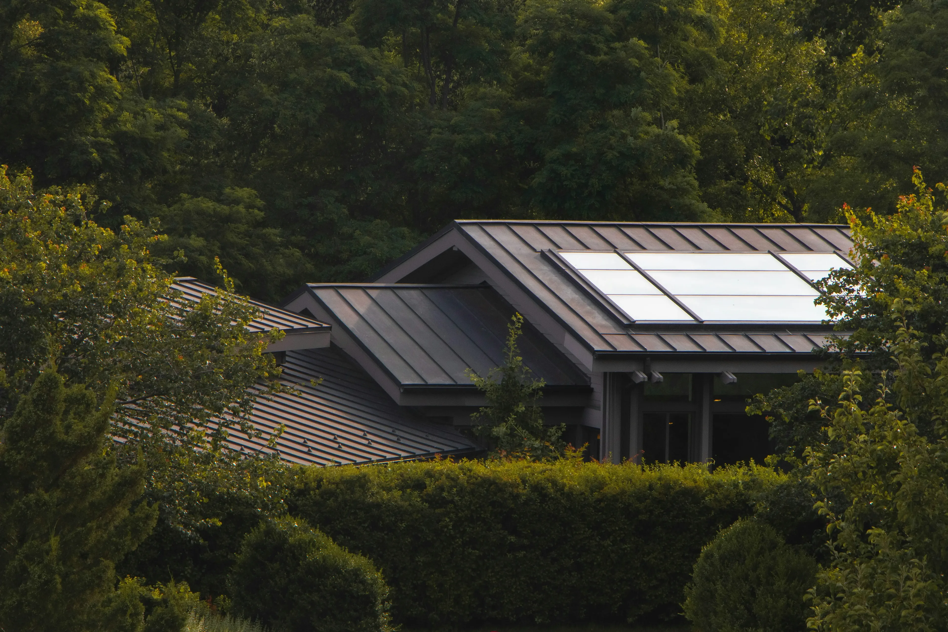 Aerial view of a residential property powered by rooftop solar panels