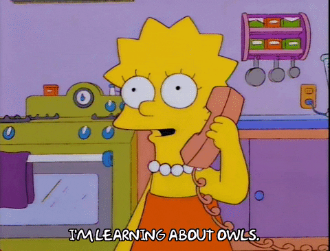 Lisa Simpson talking on the phone with eager expression