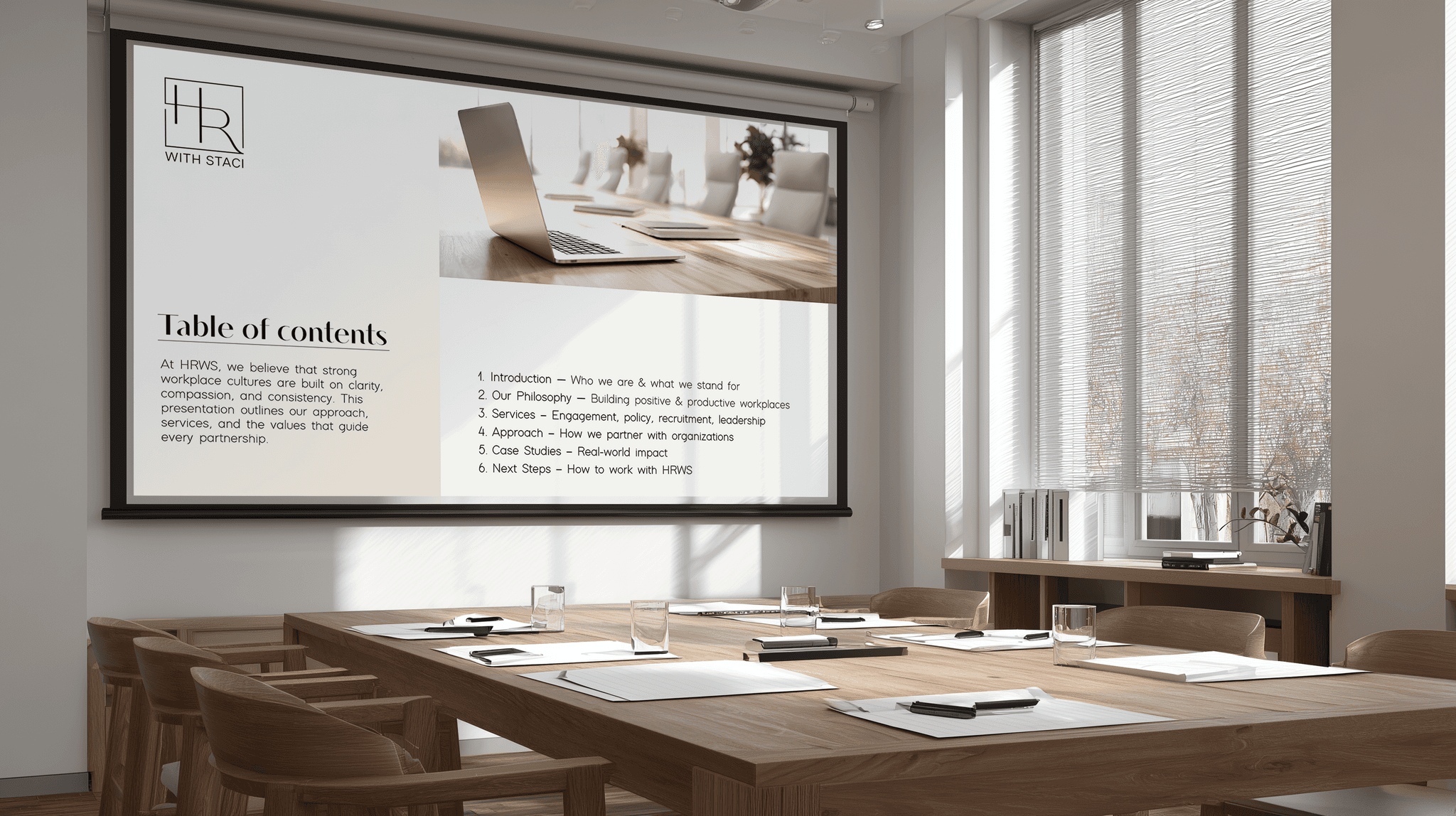company board room with branded company writing on screen