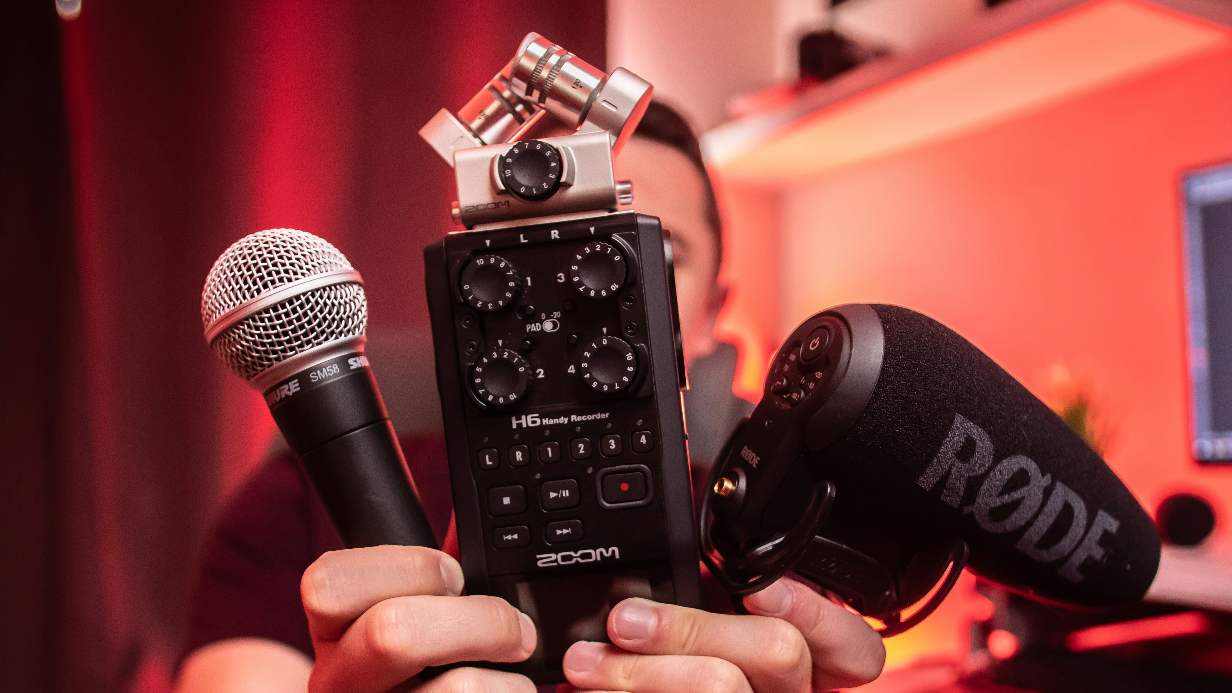 man holding sound equipment to Train AI Voice