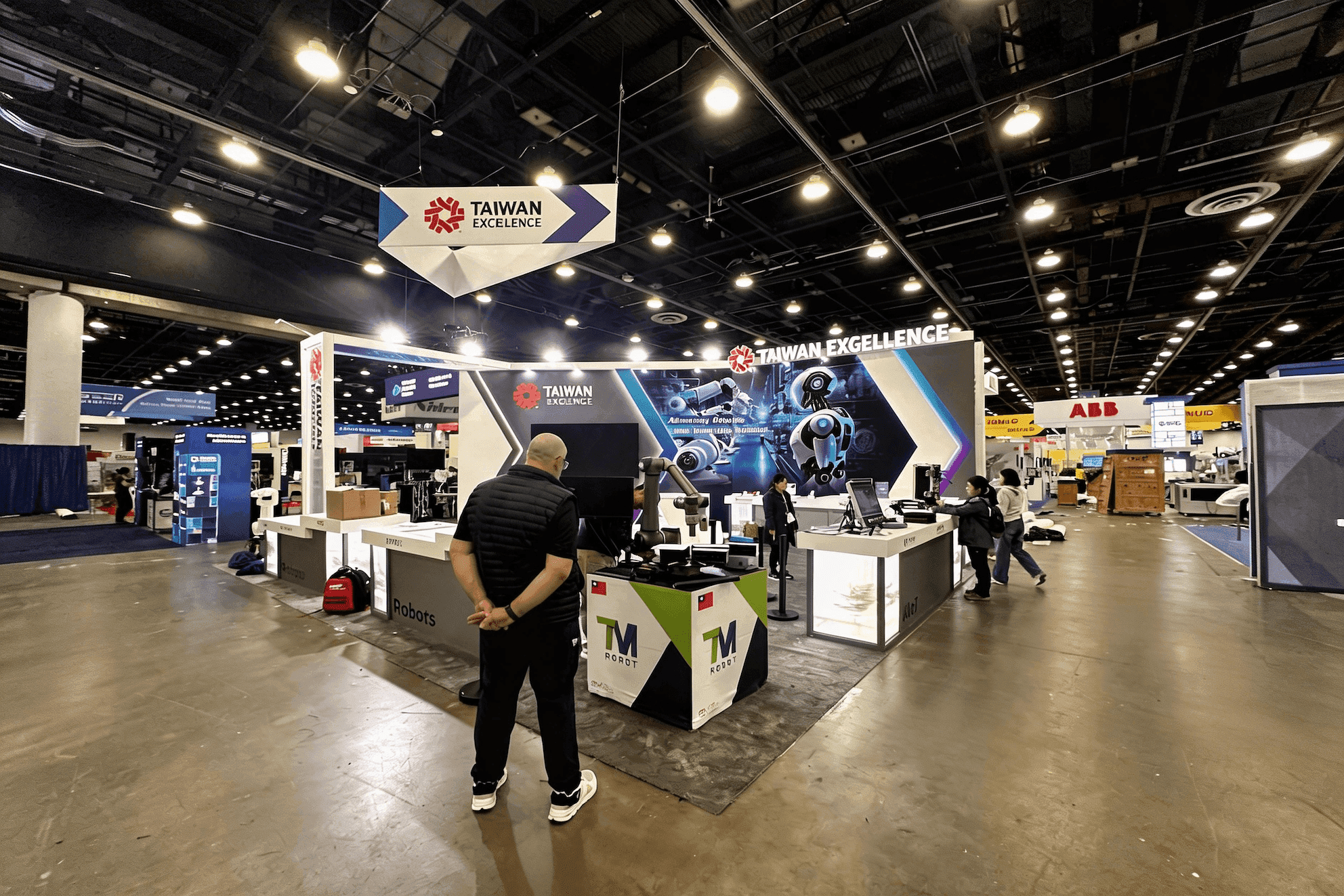 Taiwan Excellence 20x30 robotics demo booth at Automate 2025 with front-facing product counters and automation display stations