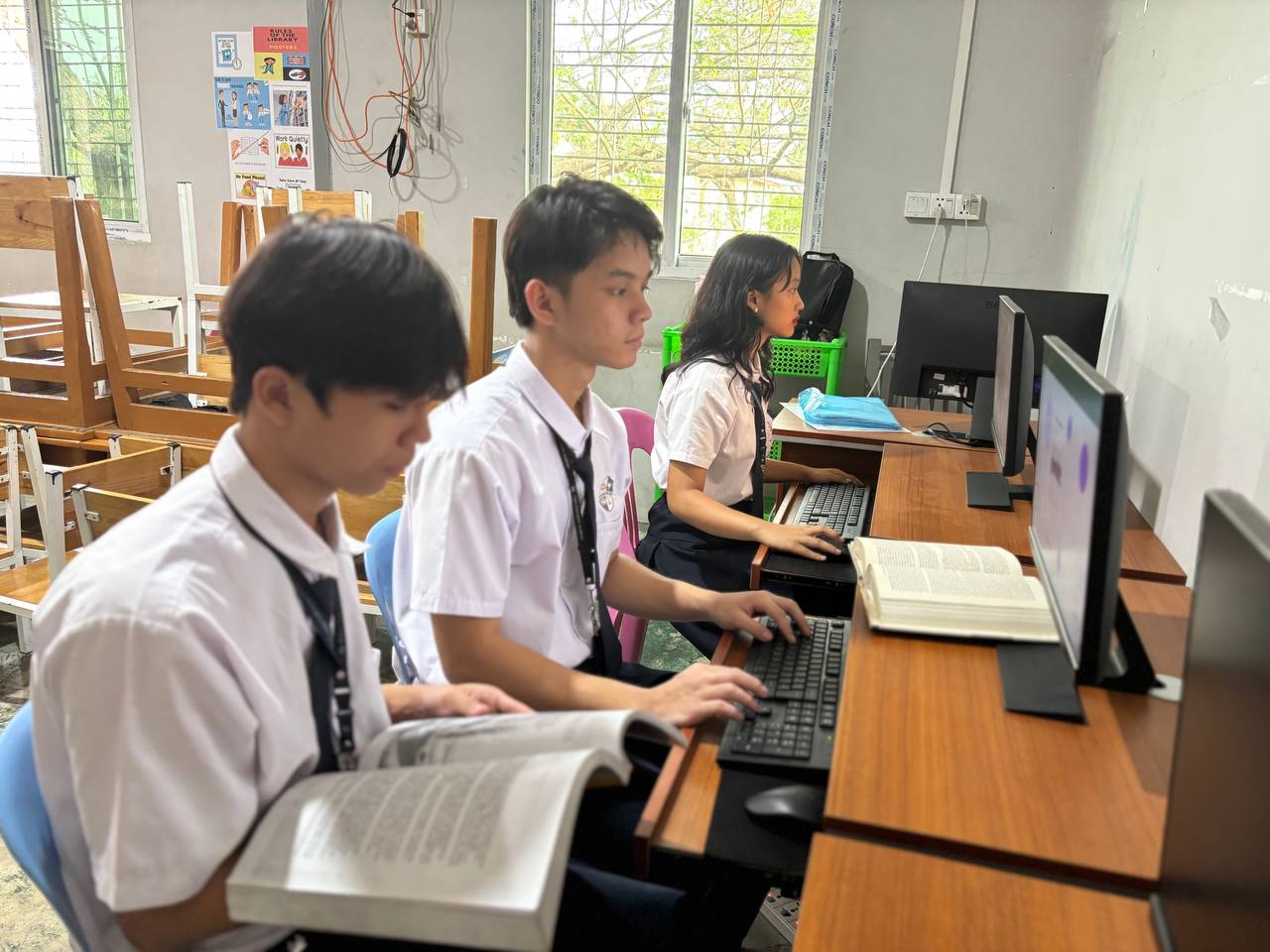 High school students at Elpis International School using computers for learning in Yangon, Myanmar