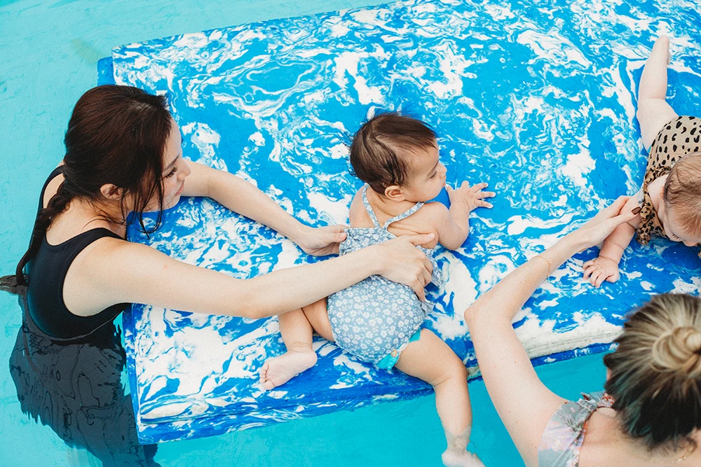 Small parent-and-child swimming lesson
