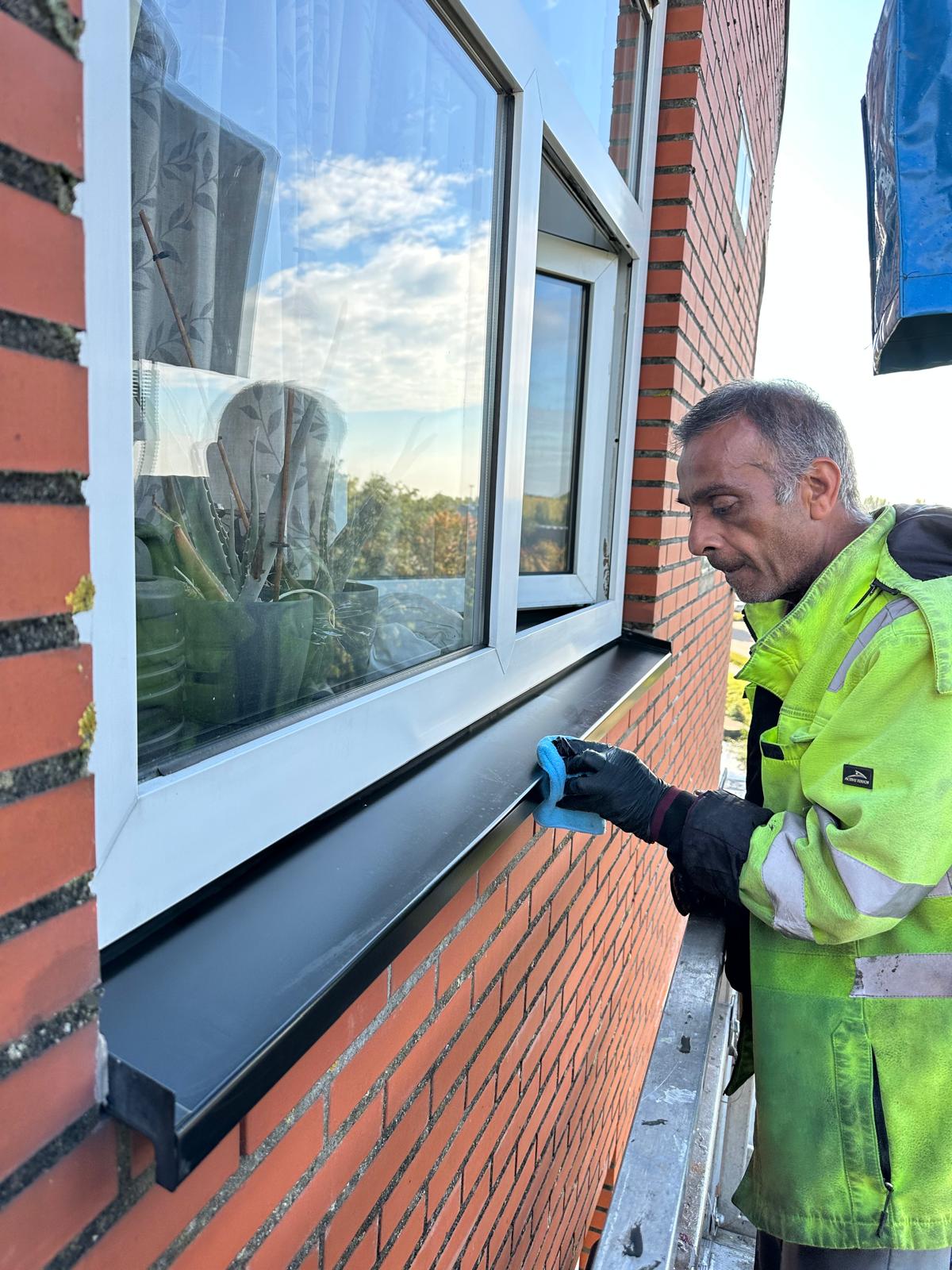 a group of children sitting on steps in front of a building