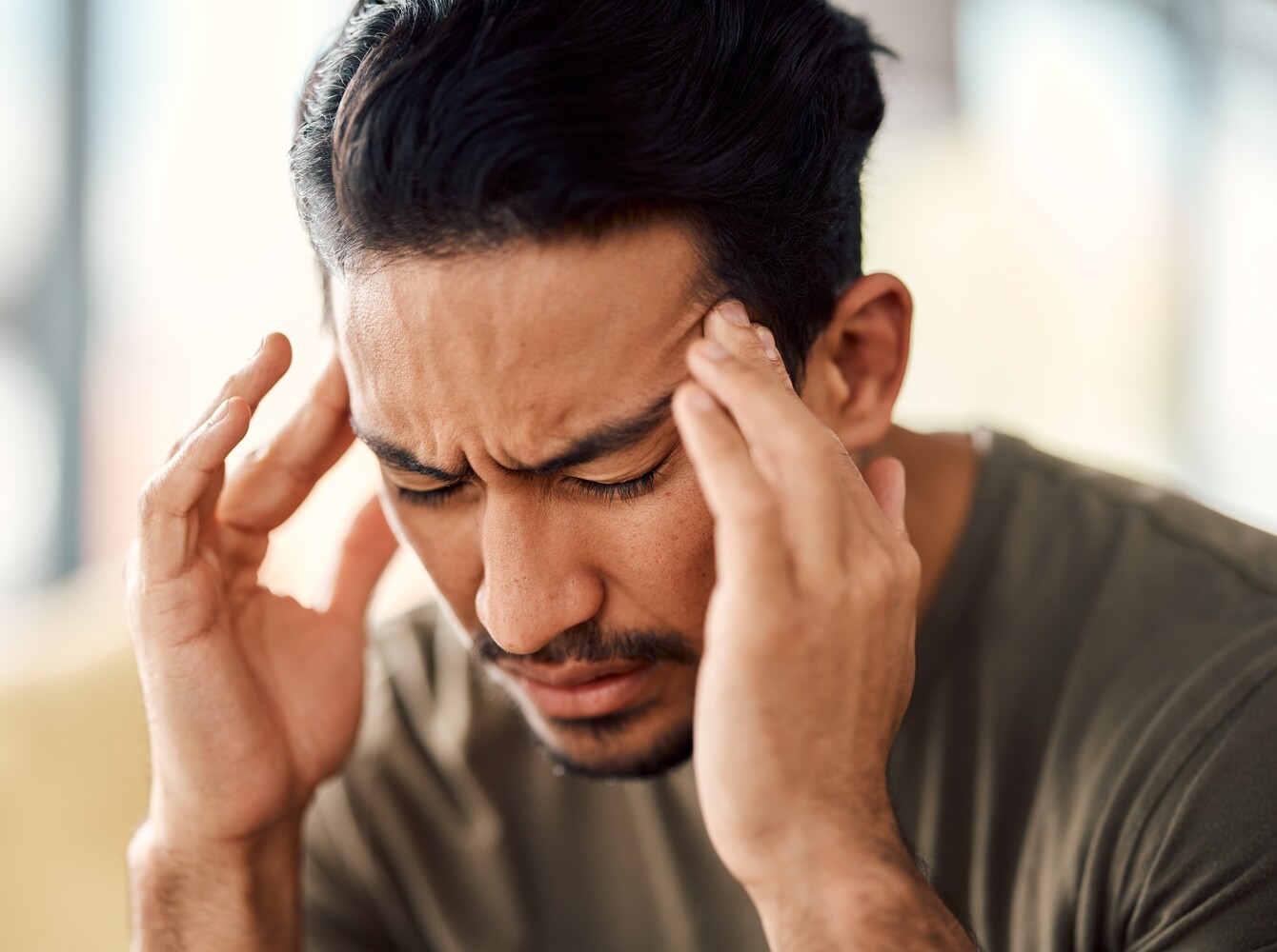 man feeling tired and ill because he hasn’t been following a healthy weight loss speed