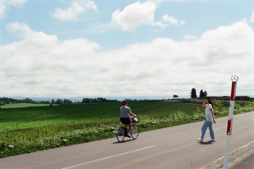 a pair of cell phones on a concrete block