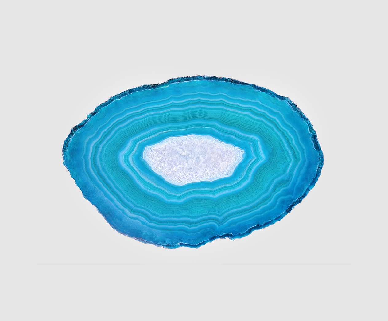 An open wrought iron garden gate leading to a green pathway, symbolising transition, stewardship, and succession planning.