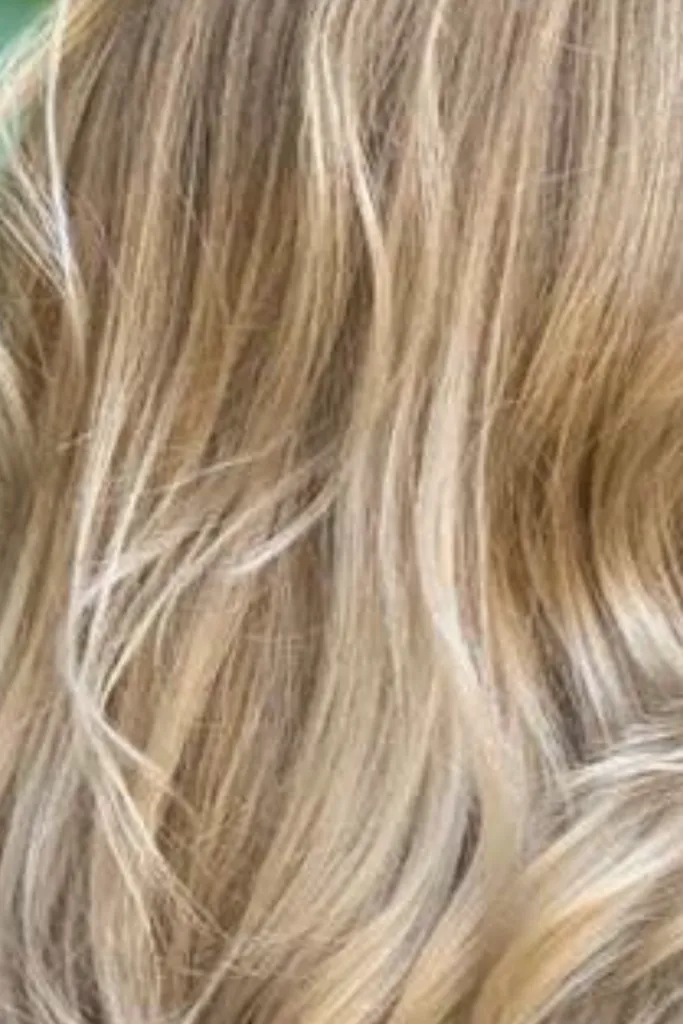 Hair color correction from gray tones to warm blonde