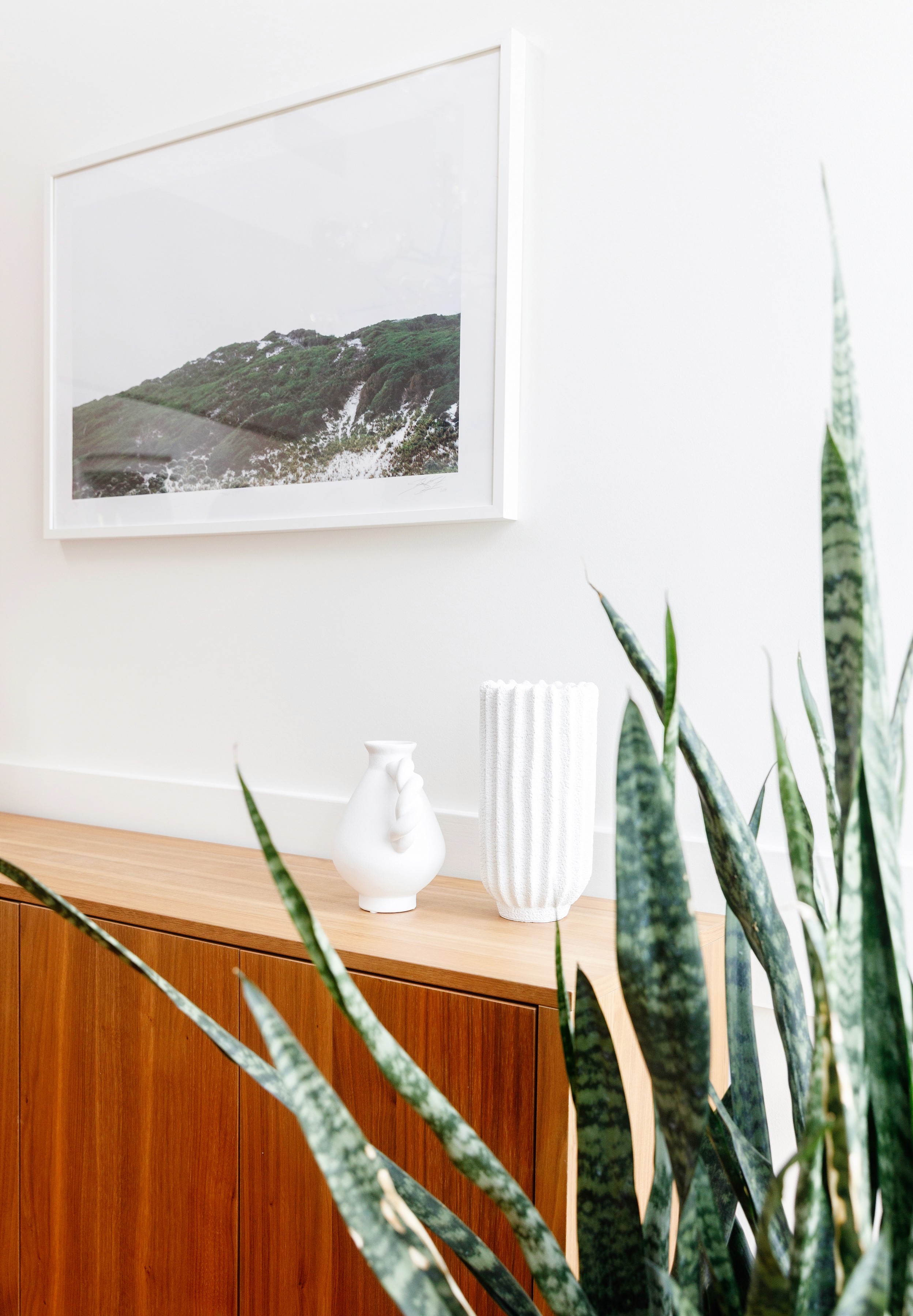 smiling happily caregiver hugging her old