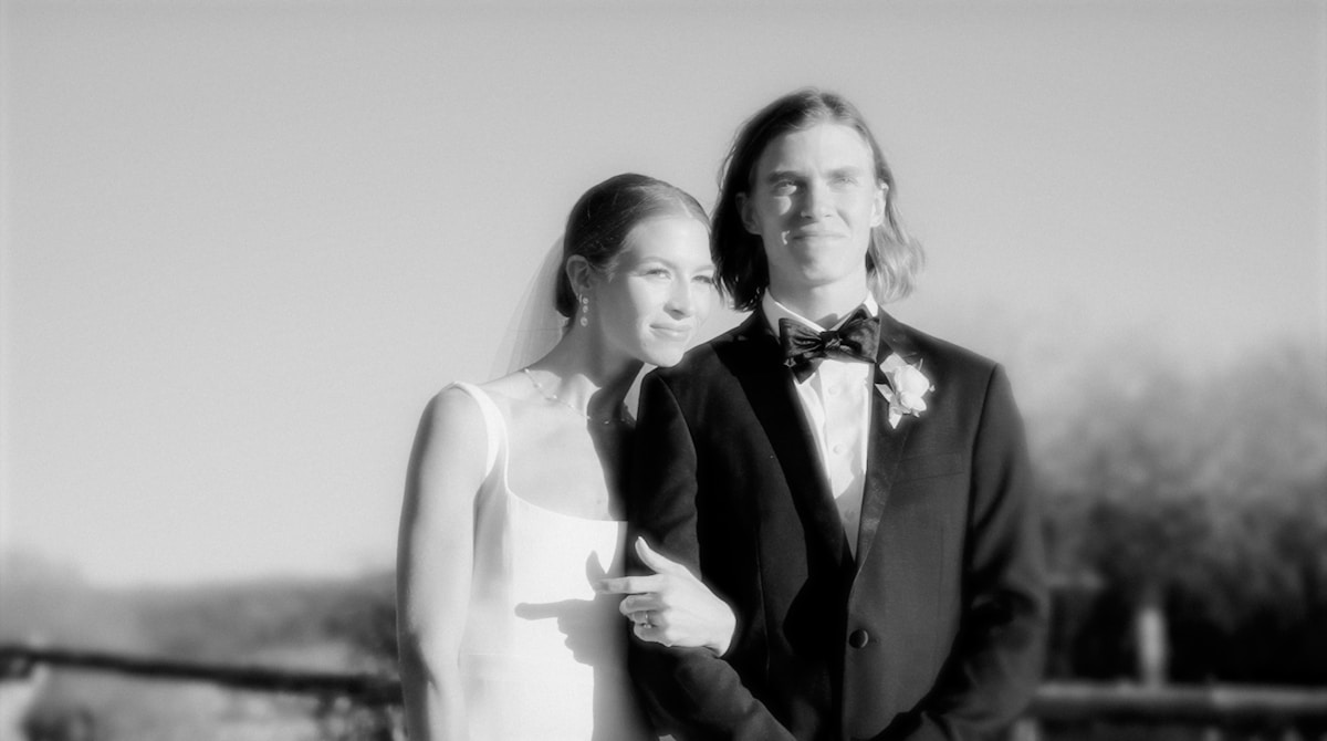 man and woman standing next to each other