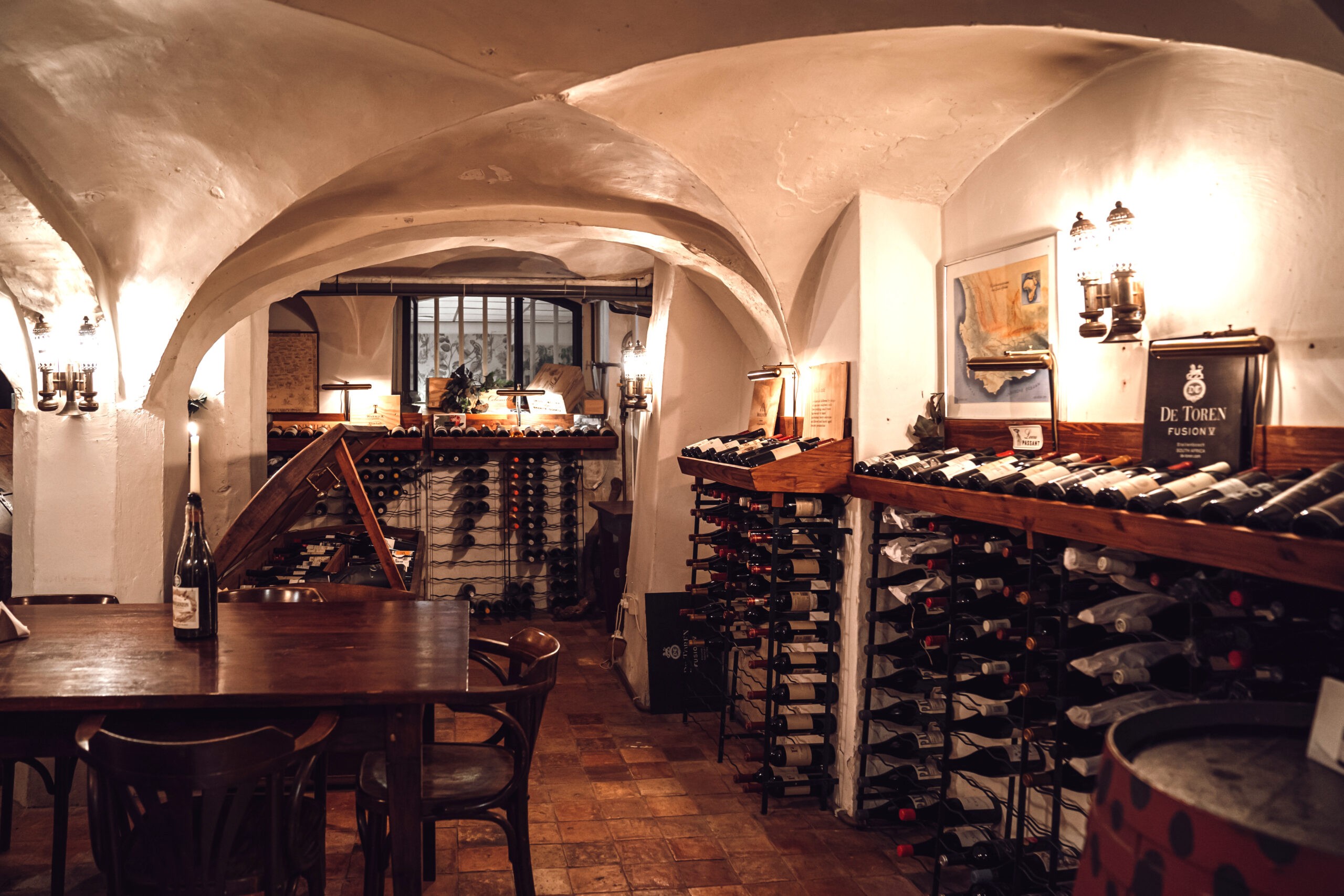 a room with a red carpet and a gold chair