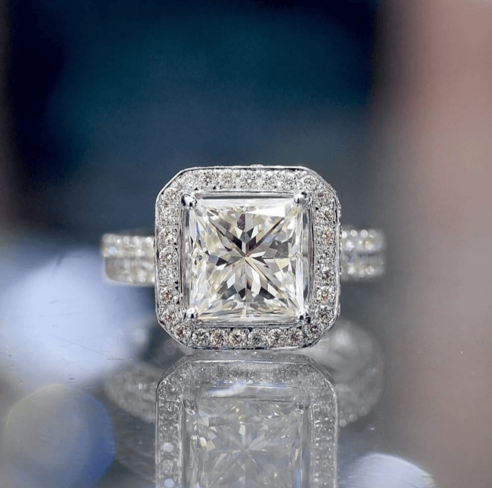 Close-up of a magnificent Princess cut CVD ring surrounded by smaller CVD accented diamonds at IIJS by Lab Grown Dreams.