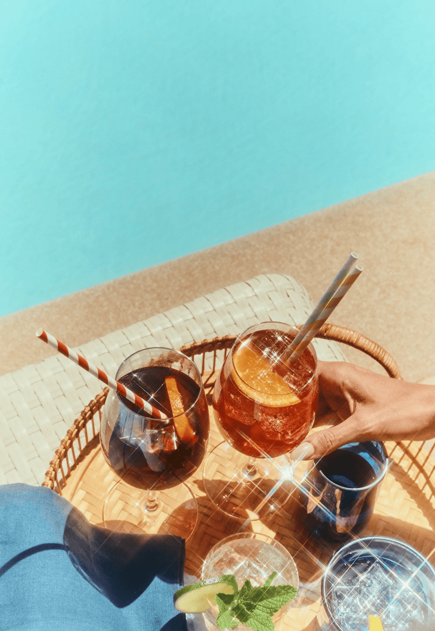 Poolside cocktails on a tray at Graton Resort & Casino, commercial still by Inquire