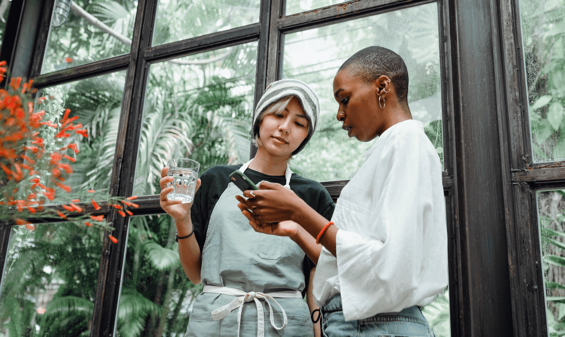 Two Women looking at mobile screen