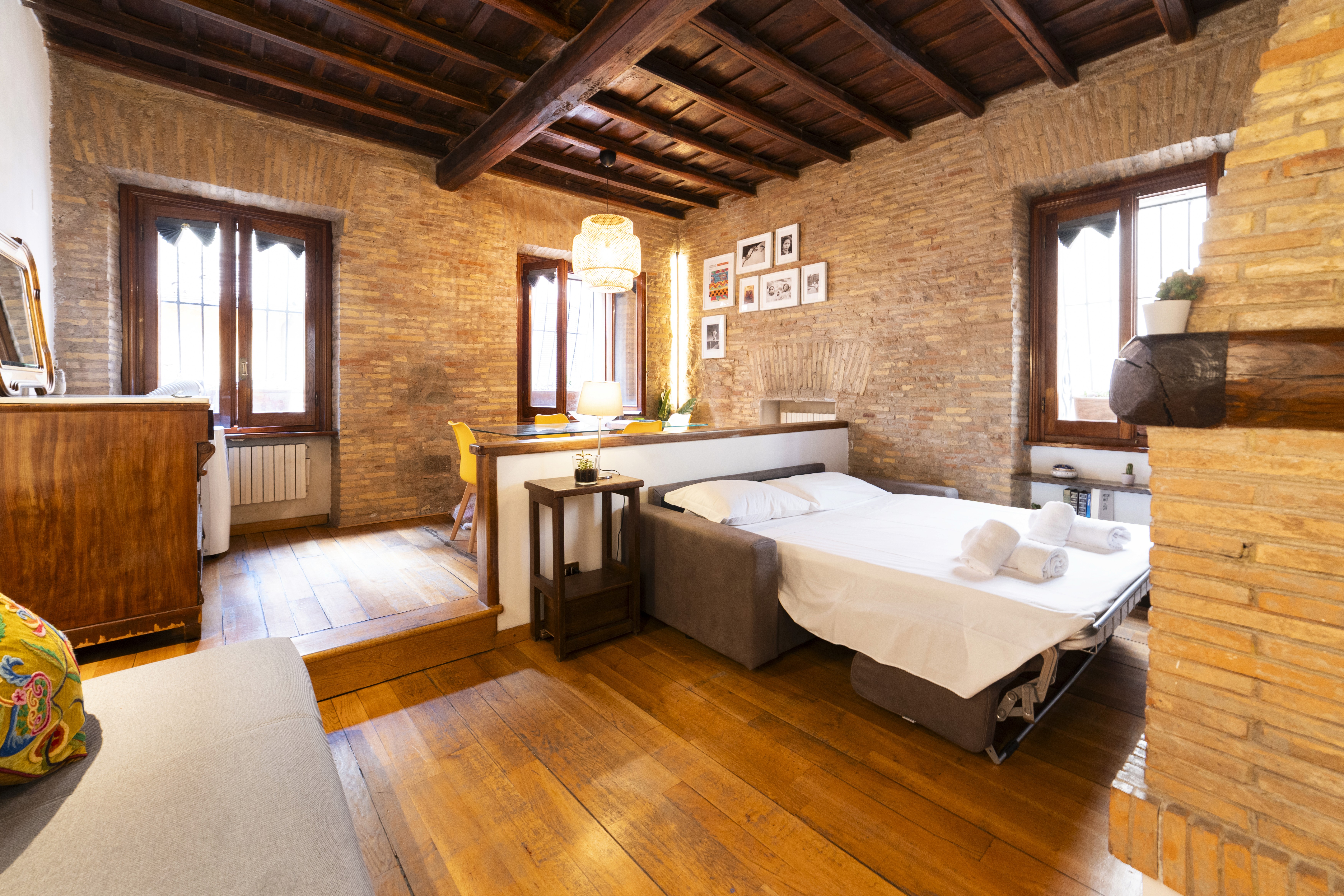 Modern shelves, purple sculptural table, and geometric desk