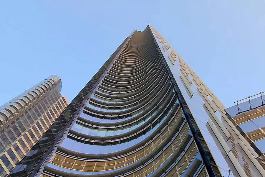 Striking vertical view of the skyscraper, perfect for businesses seeking a prestigious address.