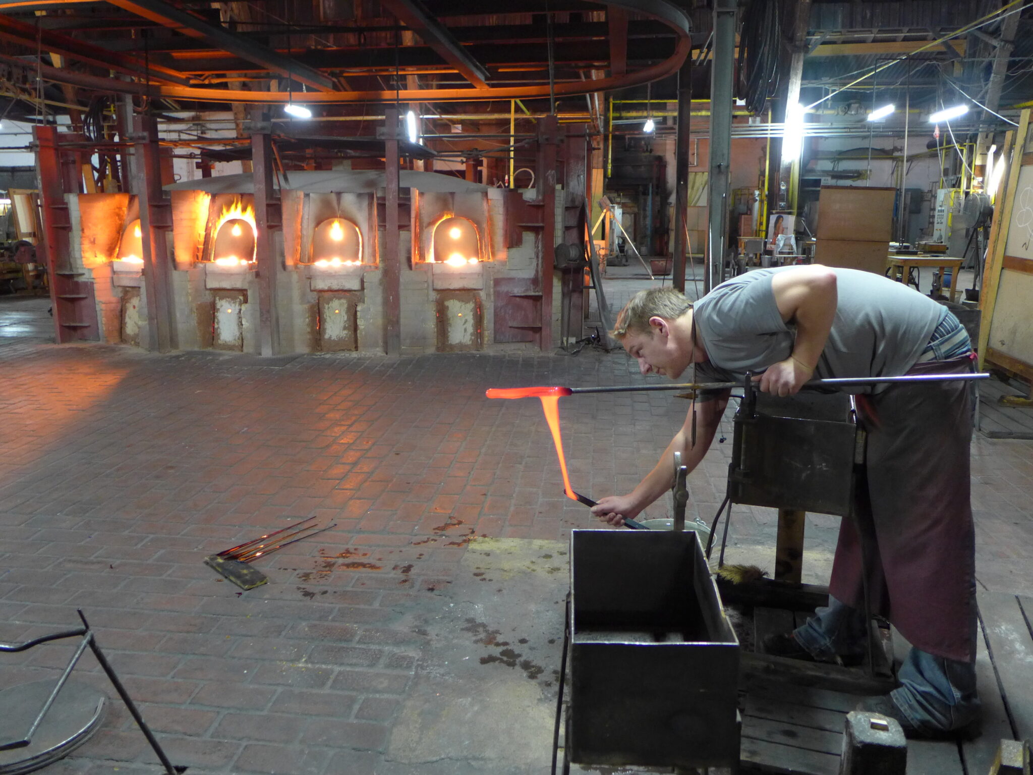 Pulling a test from the furnace at Lamberts the night before blowing the glass
