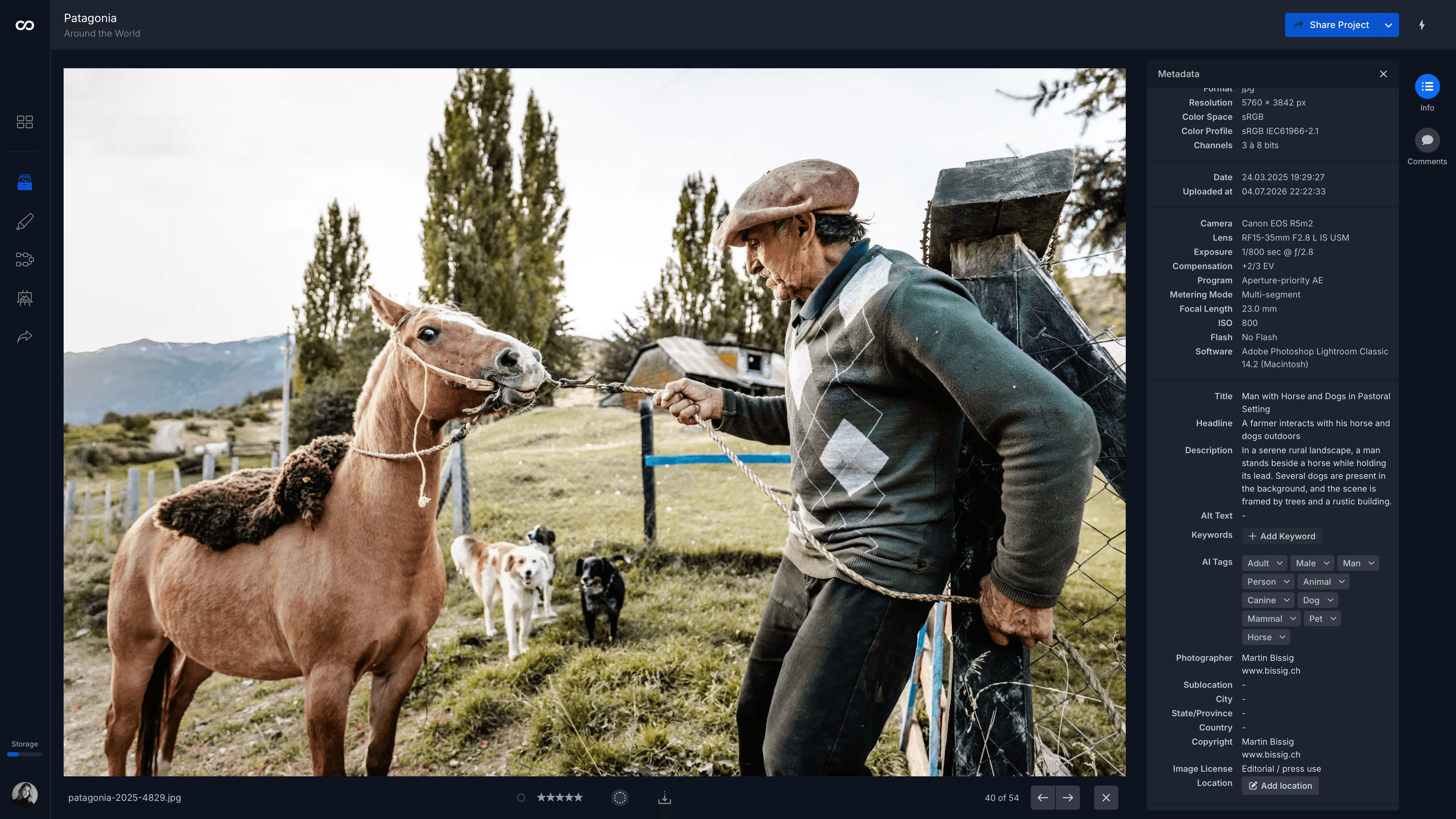 The moodcase library detail view in dark mode showing the same photograph of the farmer and horse, with the Metadata panel open on the right. The panel lists resolution, camera and exposure data, a machine-written title, headline and description, ten AI Tags, and empty Alt Text and Keywords fields, above Photographer and Copyright entries for Martin Bissig and an Image License reading Editorial / press use.