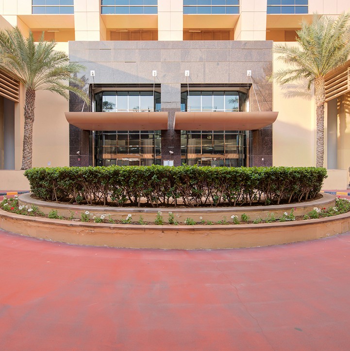 Professional entrance and lobby area of a luxury residential building, highlighting expert property management.