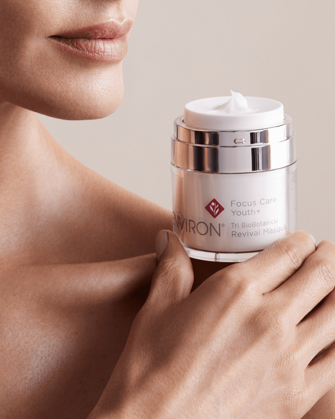 white and black plastic bottle beside white heart shaped ornament