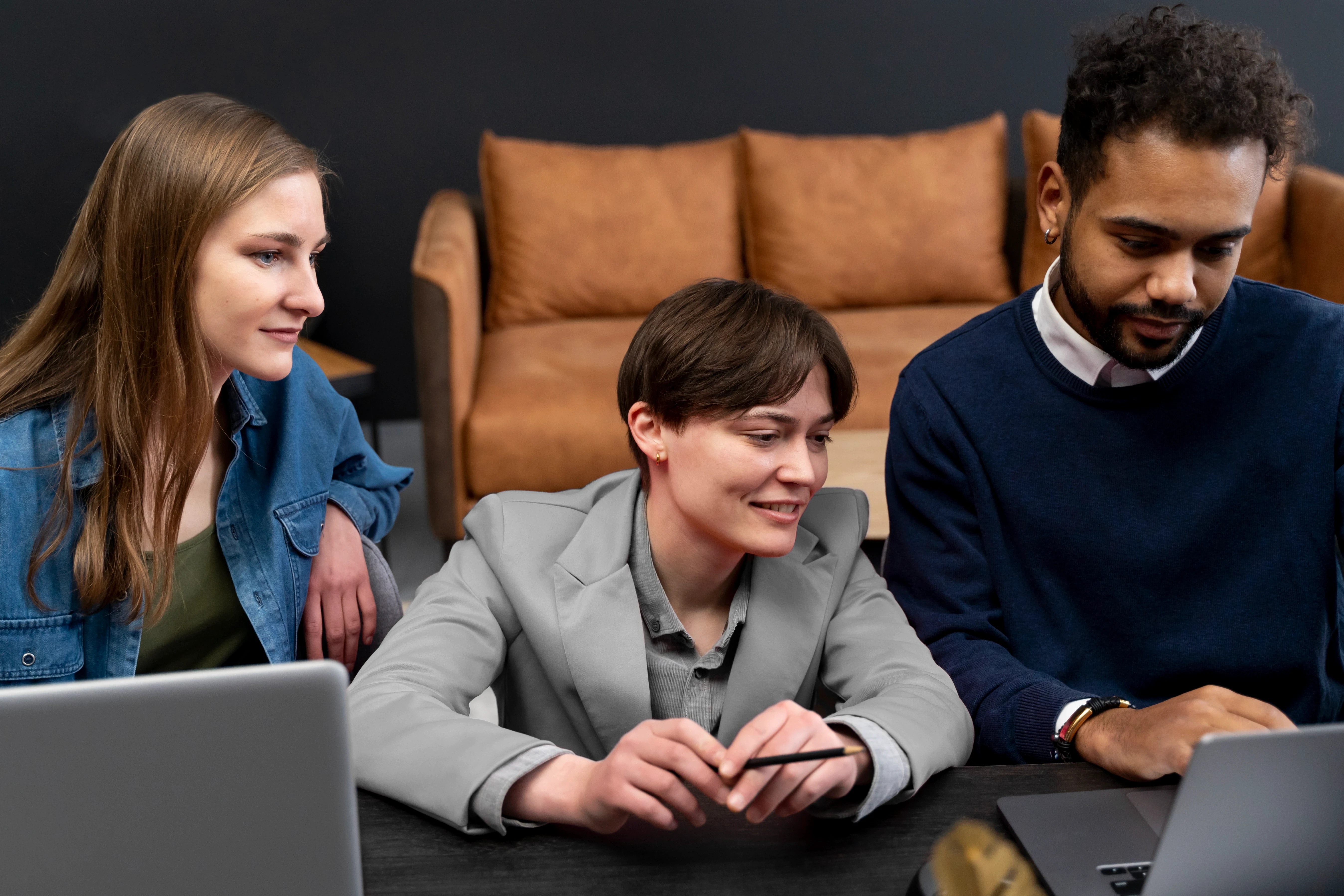 trans-person-working-office-with-colleagues
