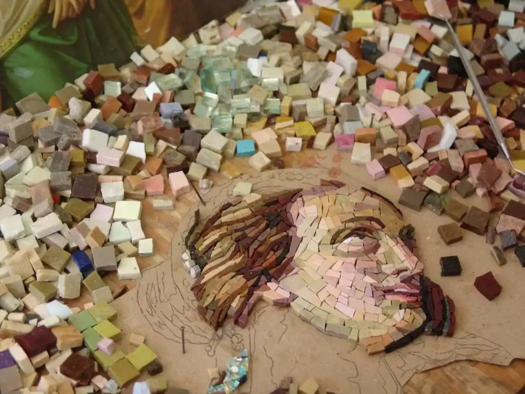 Detailed mosaic of Mary Magdalene inspired by John 8:7, created with colorful tiles.