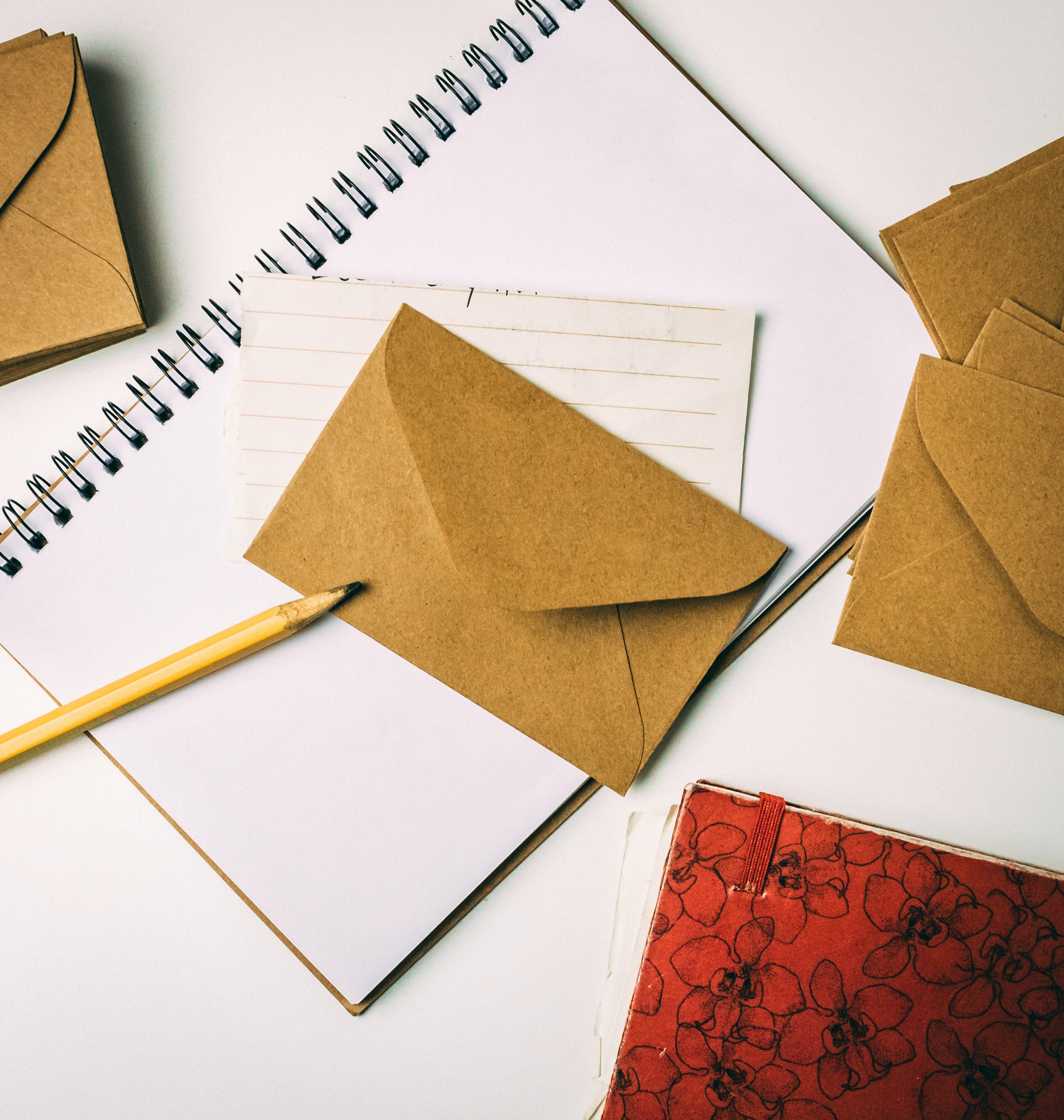 brown envelope on notebook