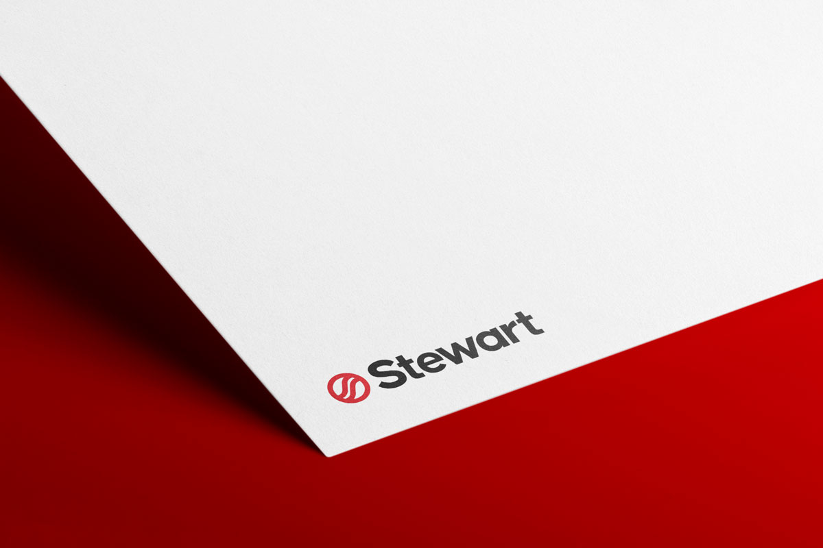 An image showing Stewart's new brand identity on stationary.