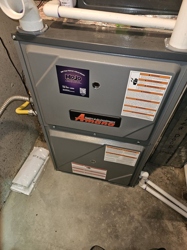 Brian and Hunter with MoJo Home Service truck in the background
