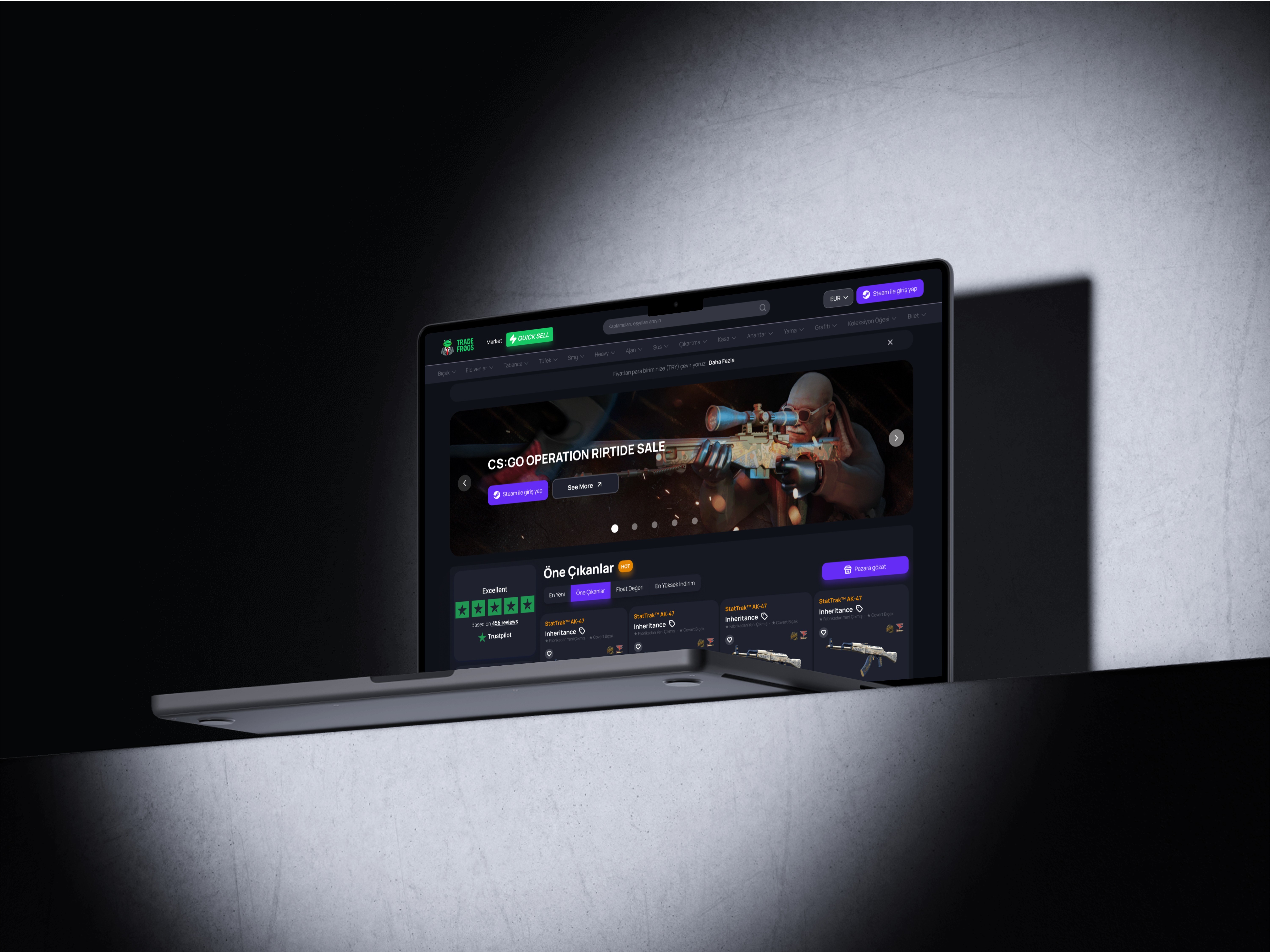 Laptop showing a gaming marketplace seasonal sale homepage.