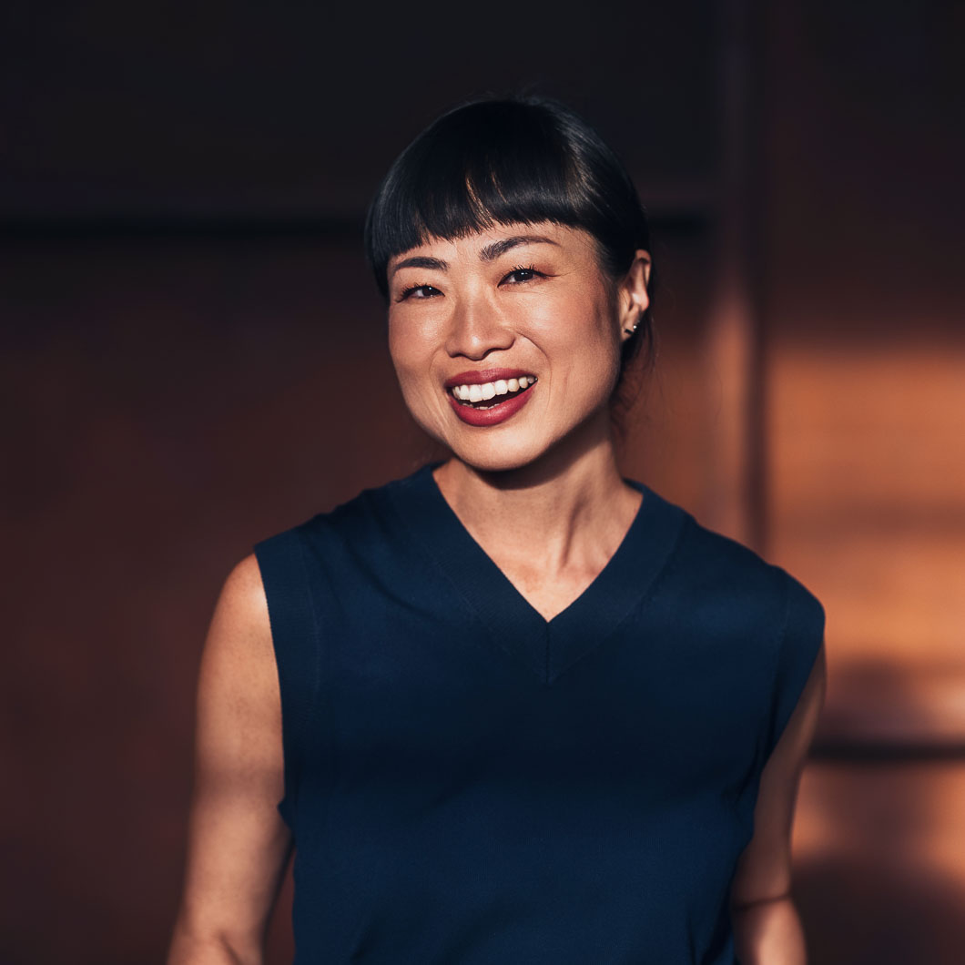R1 visa lawyer smiling in professional portrait