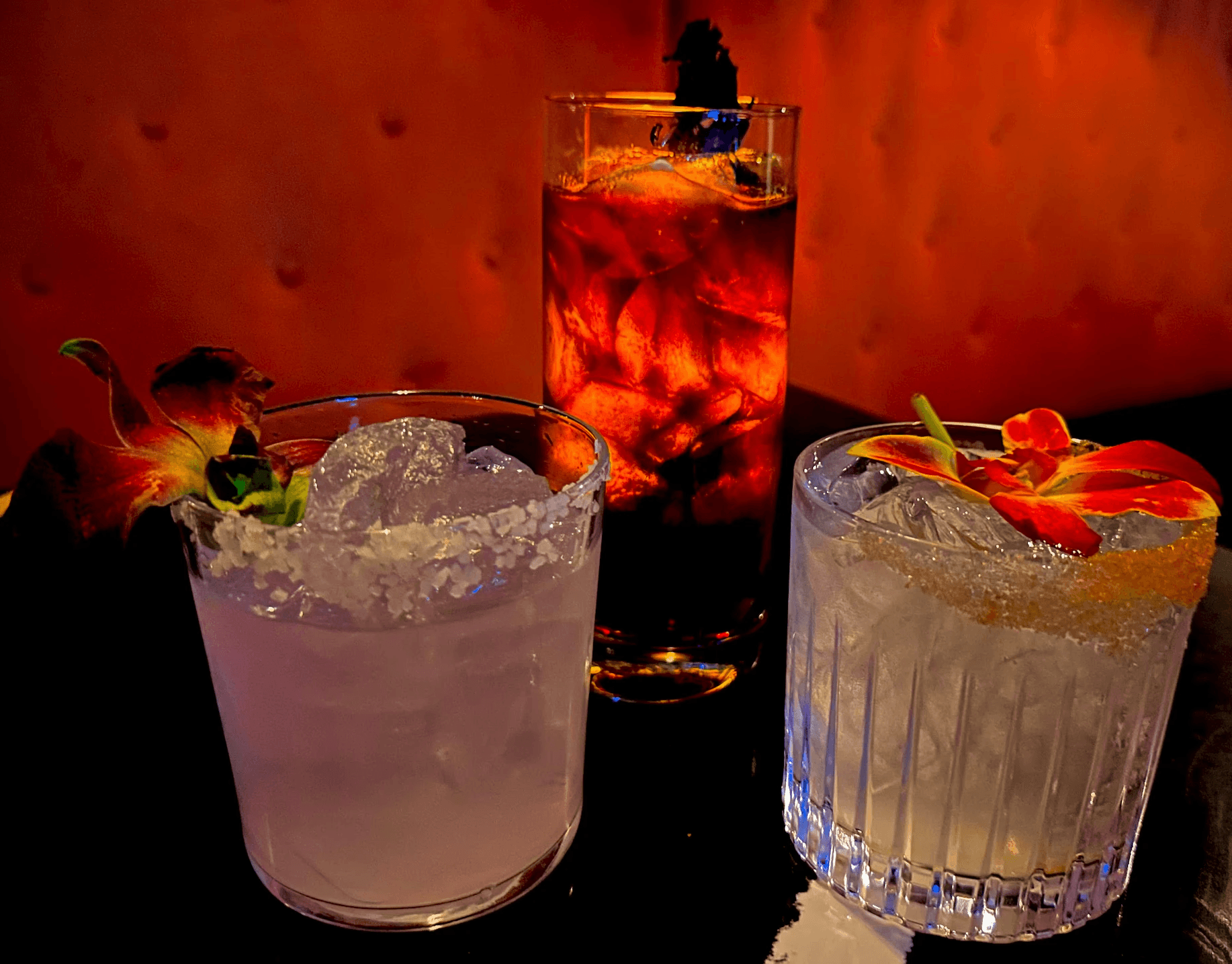 agave drinks low light garnished with orchids