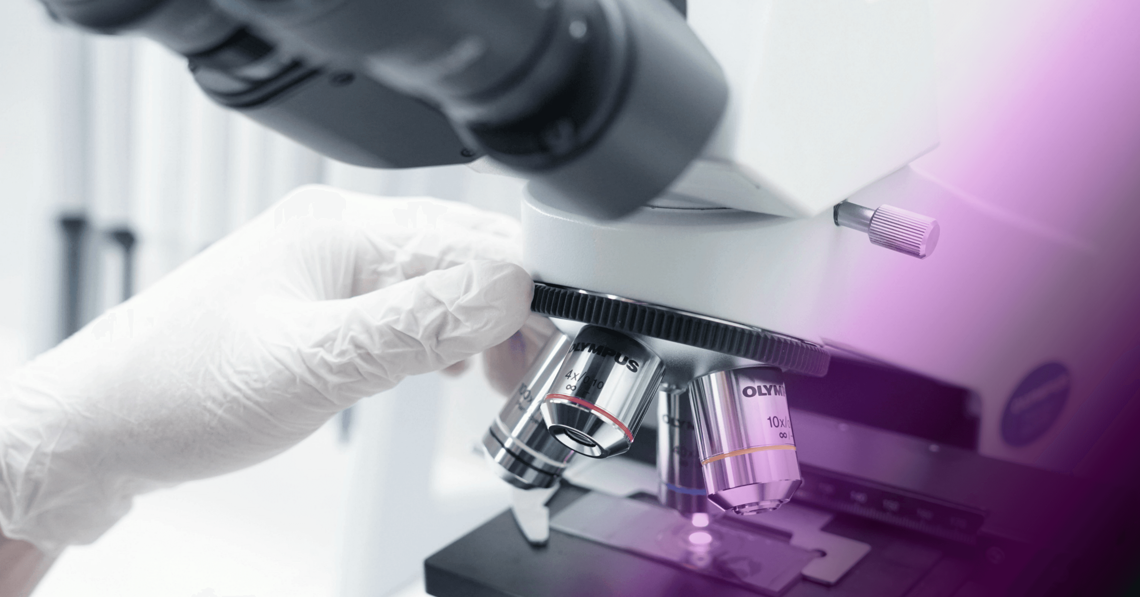 Close-up of microscope lens for medical research.