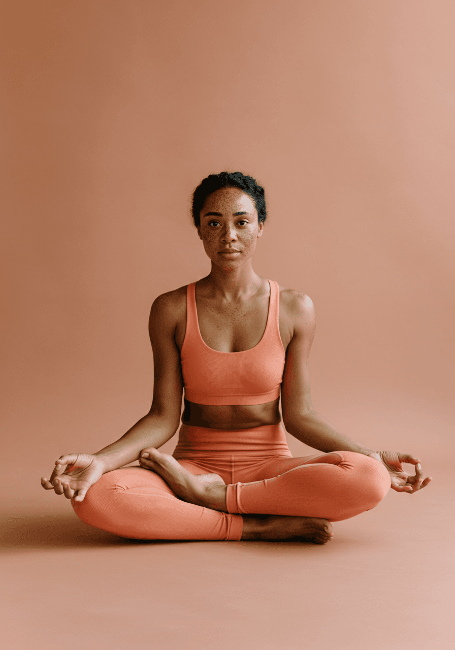 Portrait shot of a woman in a yoga pose.