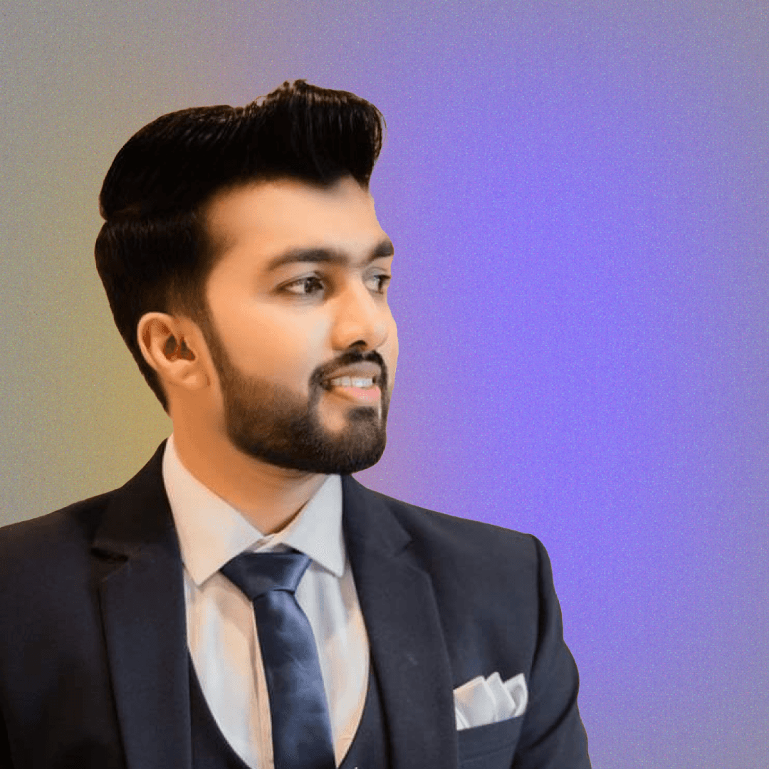 image of man wearing glasses folding his arms